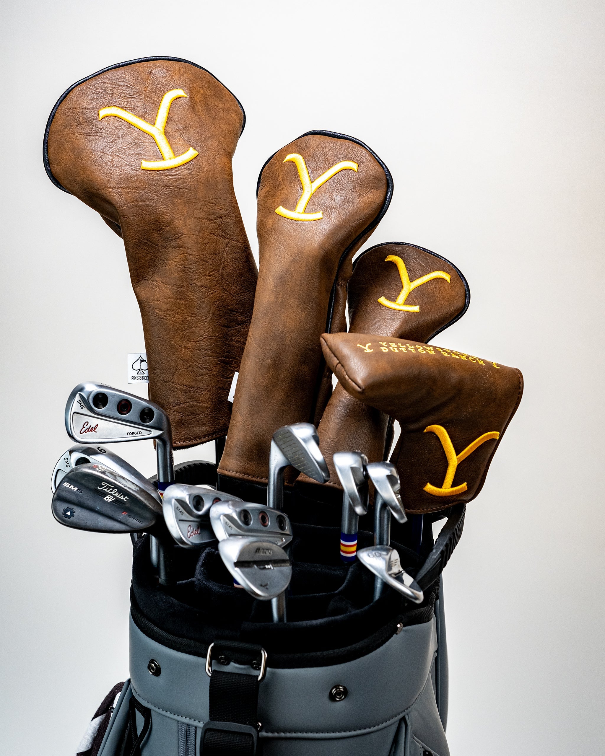 Yellowstone Driver Cover featuring a vibrant mountain landscape design with the Yellowstone National Park logo, designed for golf clubs.