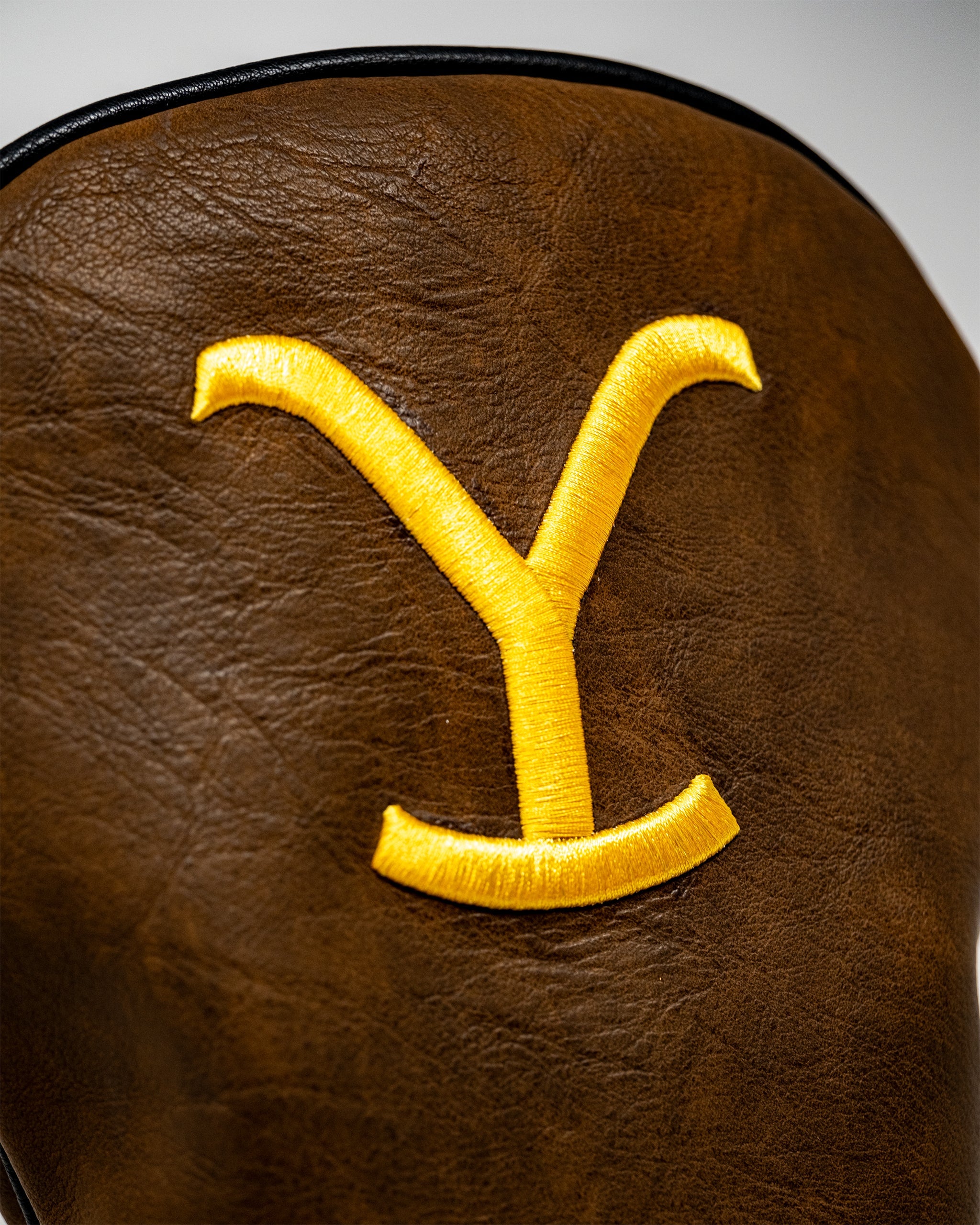 Yellowstone Driver Cover featuring a scenic mountain landscape design with vibrant colors and a soft fabric exterior.