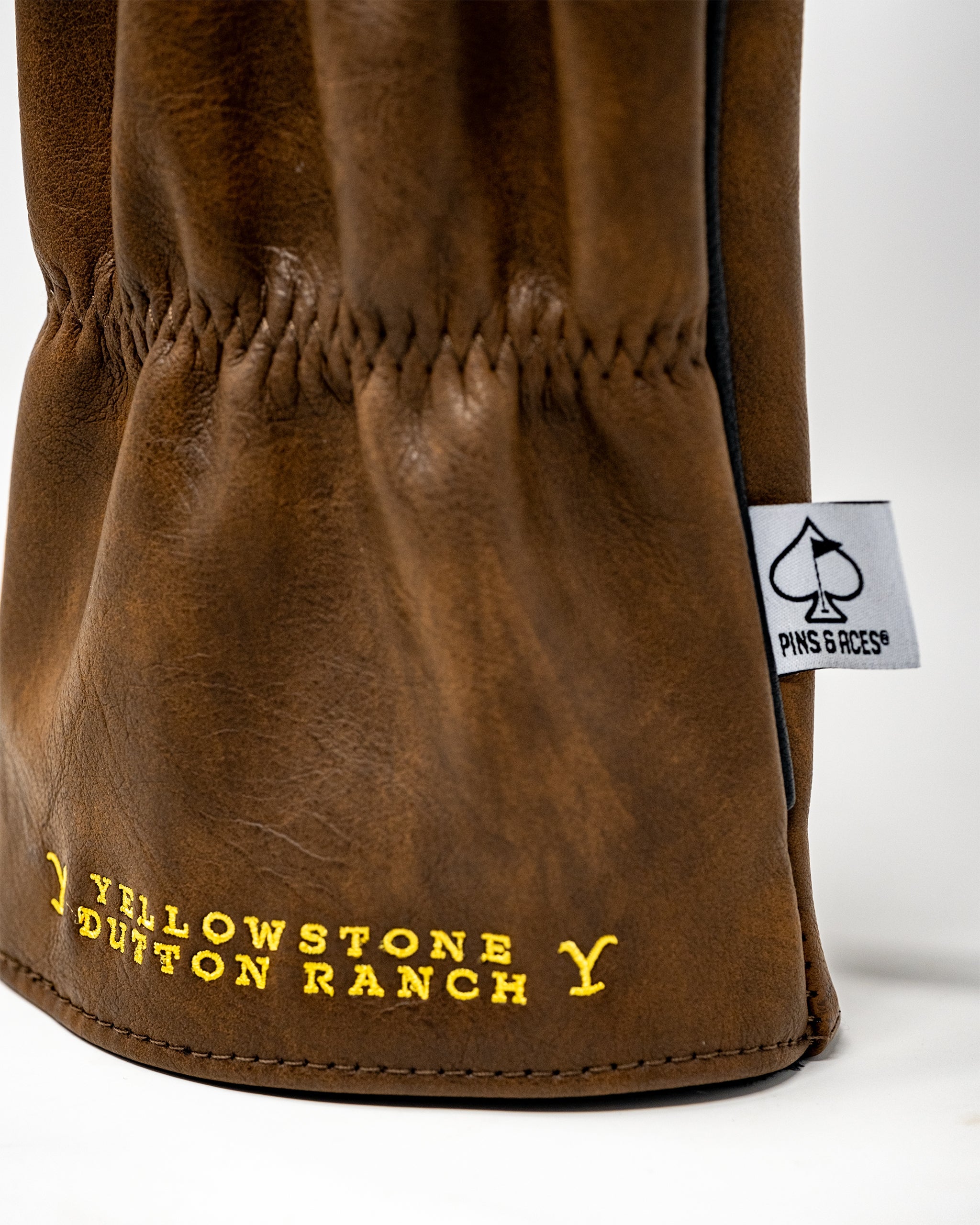 Yellowstone Driver Cover featuring a vibrant graphic design inspired by the Yellowstone National Park landscape.