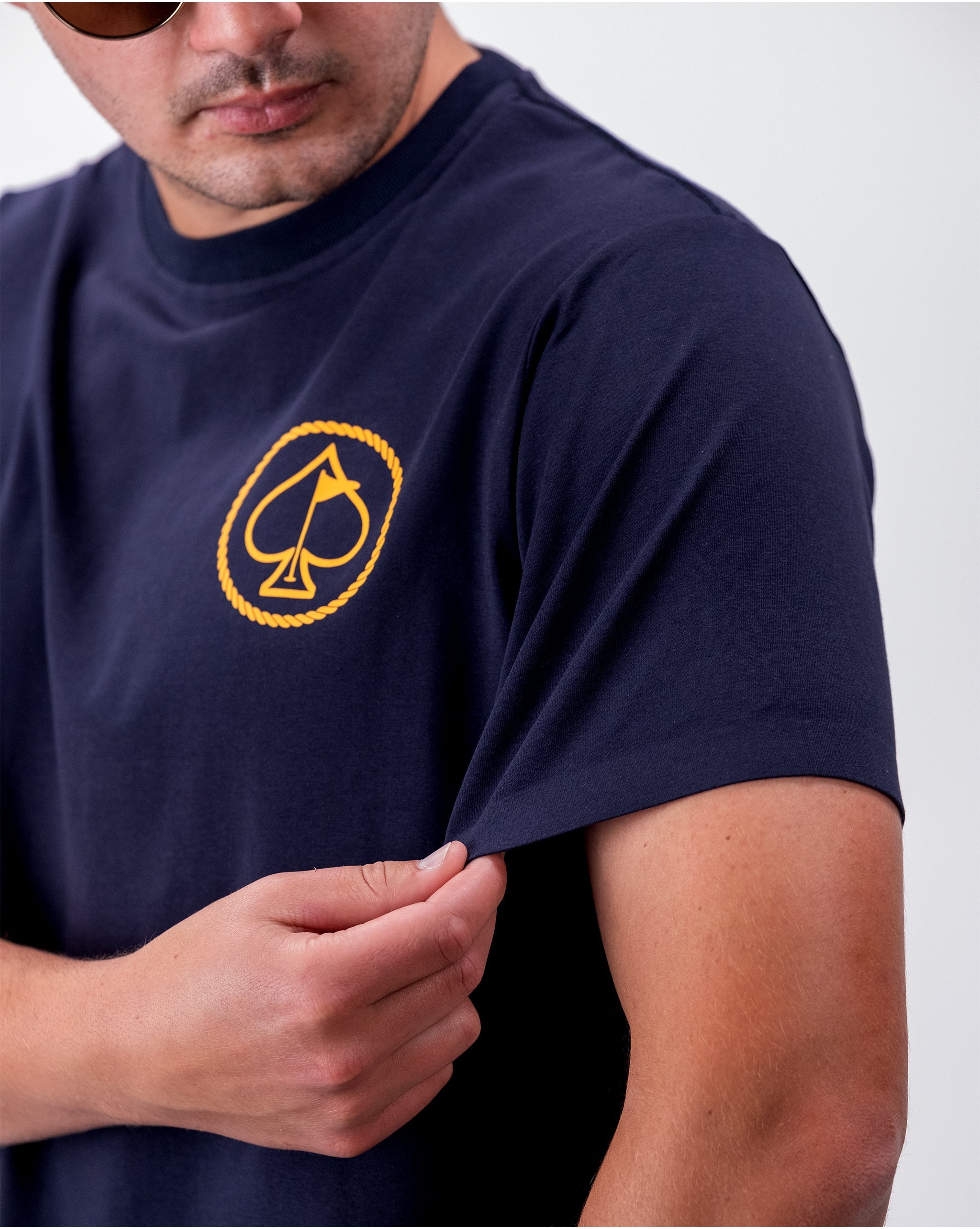 Yellowstone Logo Tee featuring a bold, rustic logo on a dark fabric background.