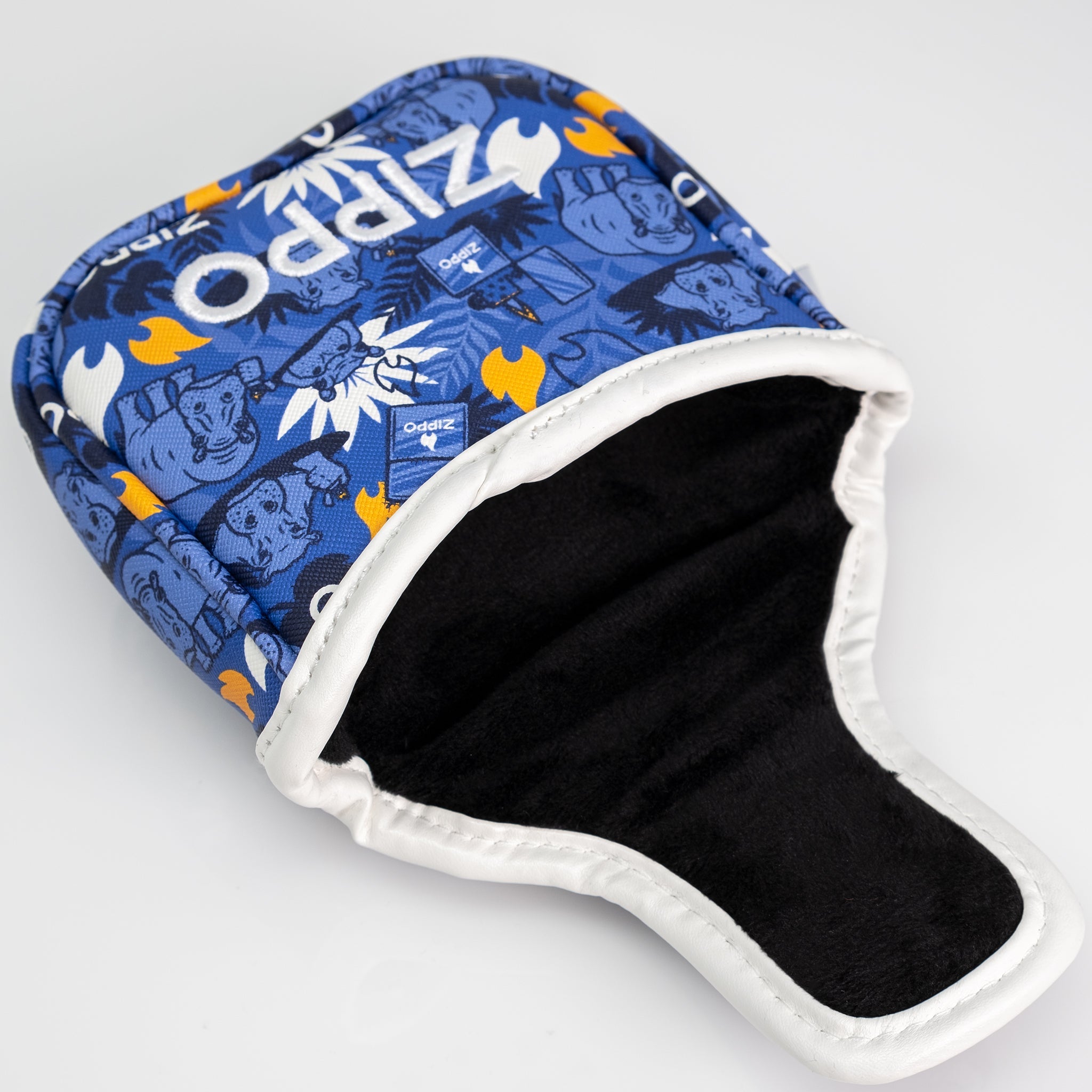 Blue Zippo mallet putter cover with animal and foliage print, white trim, and black interior lining.