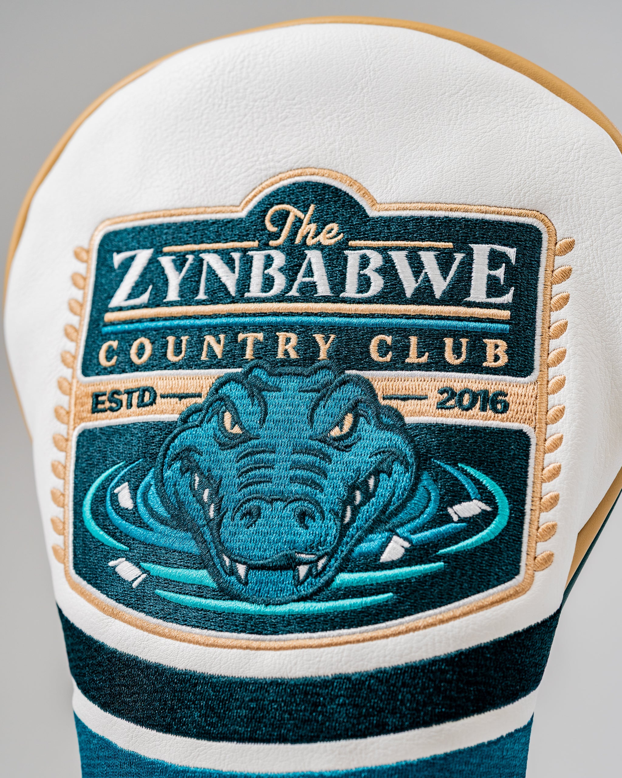 Bold driver cover featuring the Zynbabwe Country Club logo with a gator design, perfect for standout golf style.