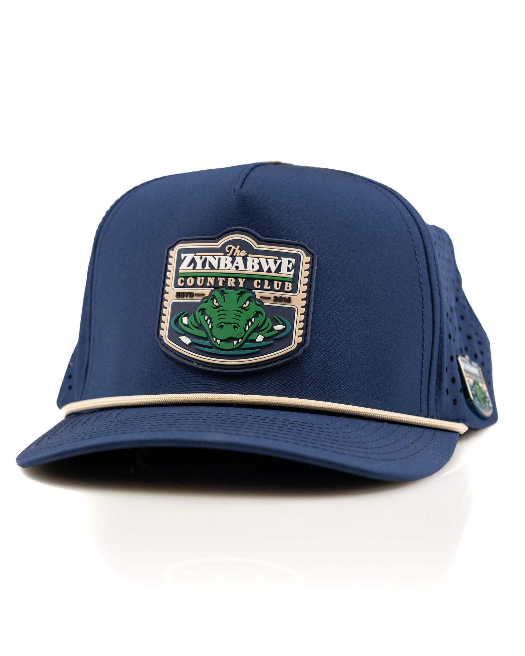 Navy perforated rope hat featuring Zynbabwe Country Club logo with a green alligator design, perfect for stylish golfers.