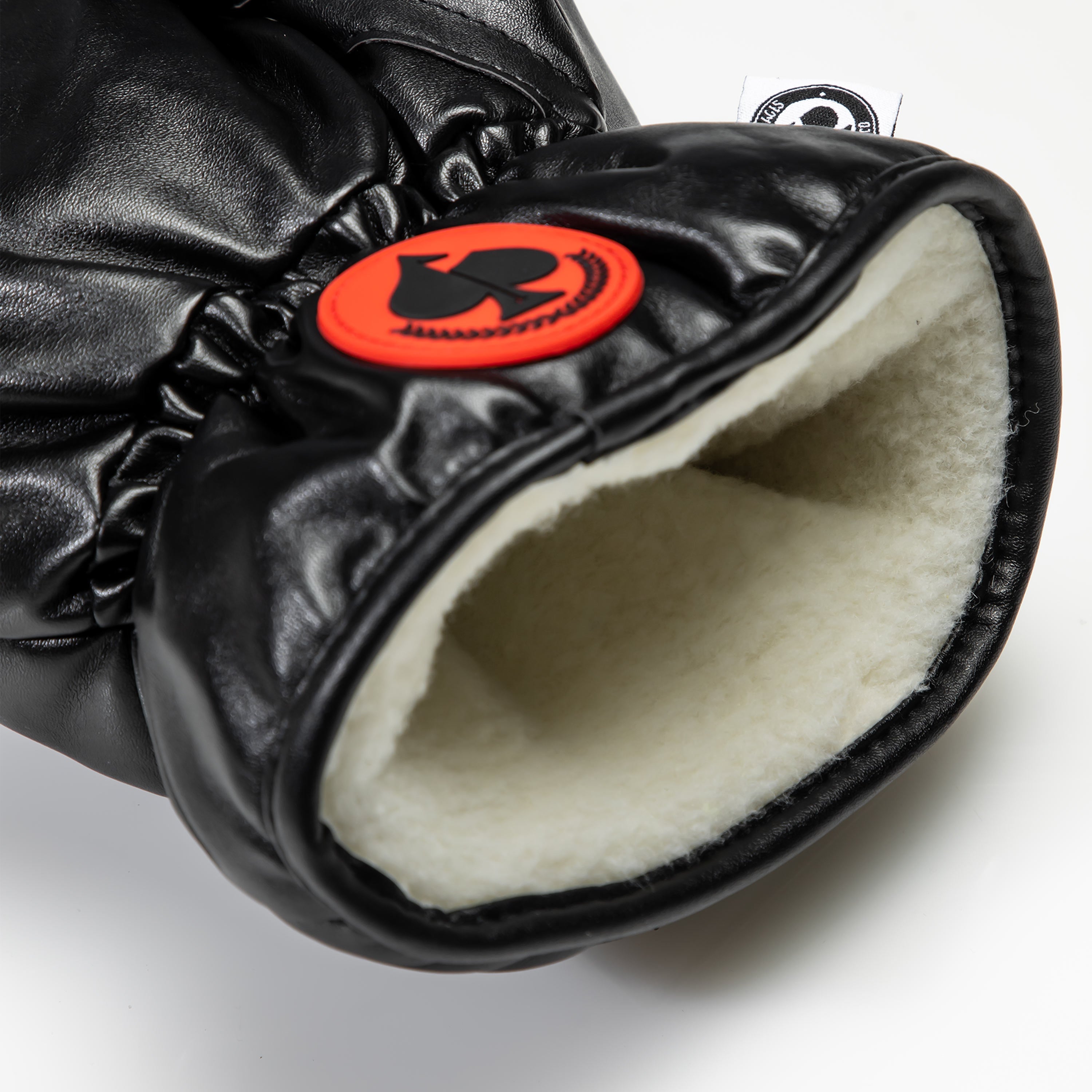 Black boxing glove driver cover for golf clubs, featuring a stylish design and durable material.