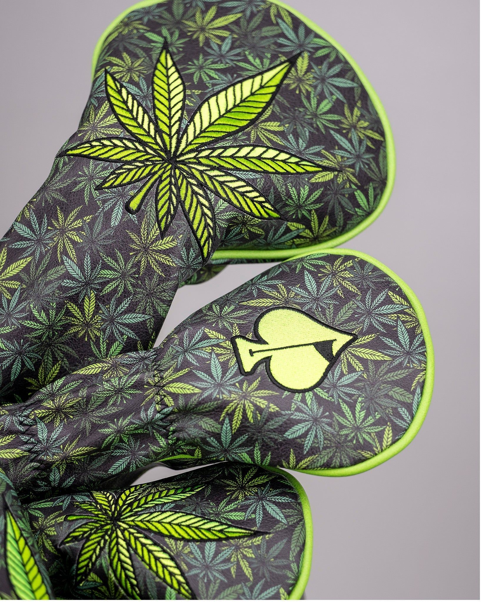 Bold fairway cover featuring a vibrant green leaf pattern and spade design, perfect for high handicap golfers seeking unique style.