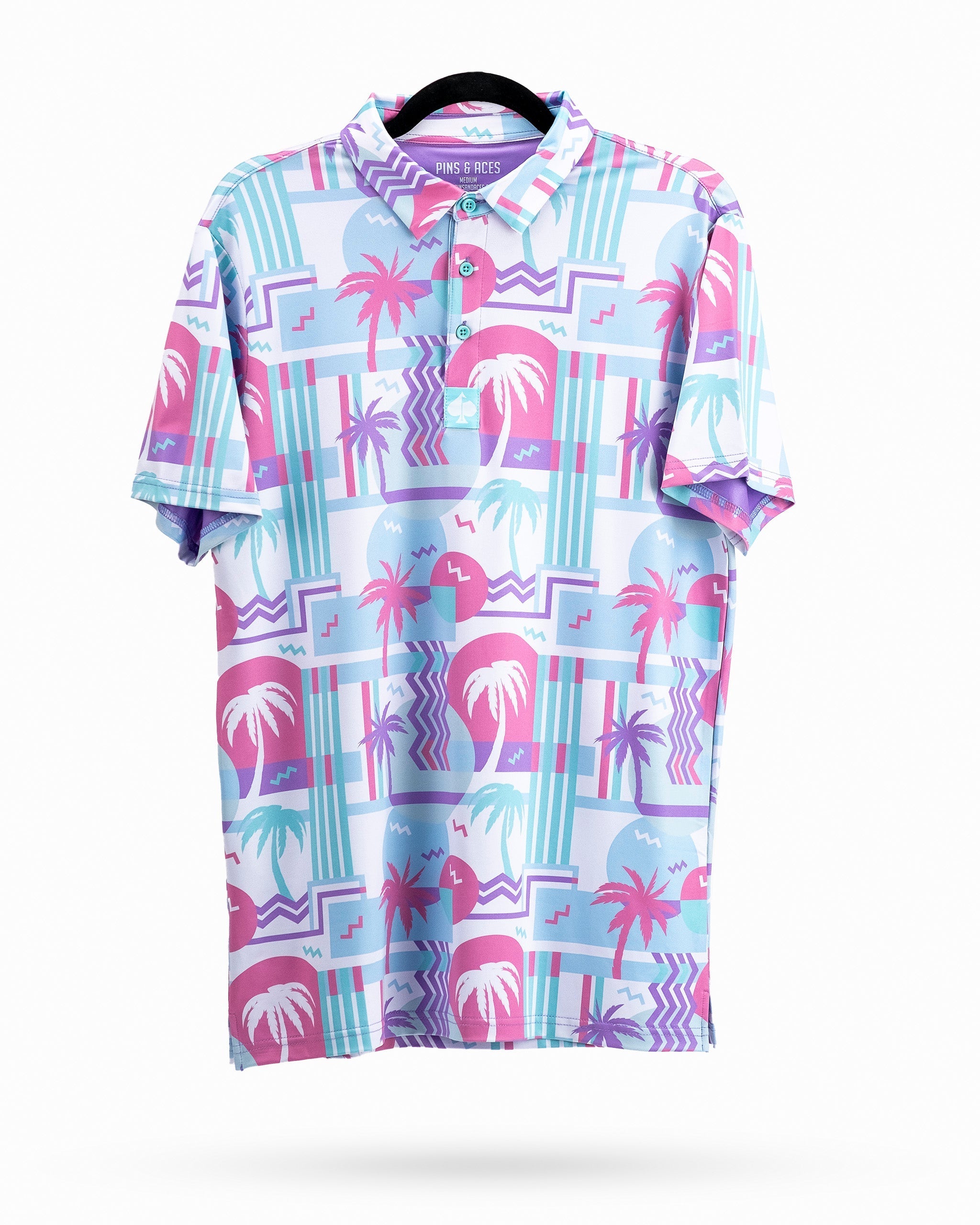 Colorful polo shirt featuring a vibrant beach-themed pattern with palm trees and geometric shapes, perfect for summer outings.