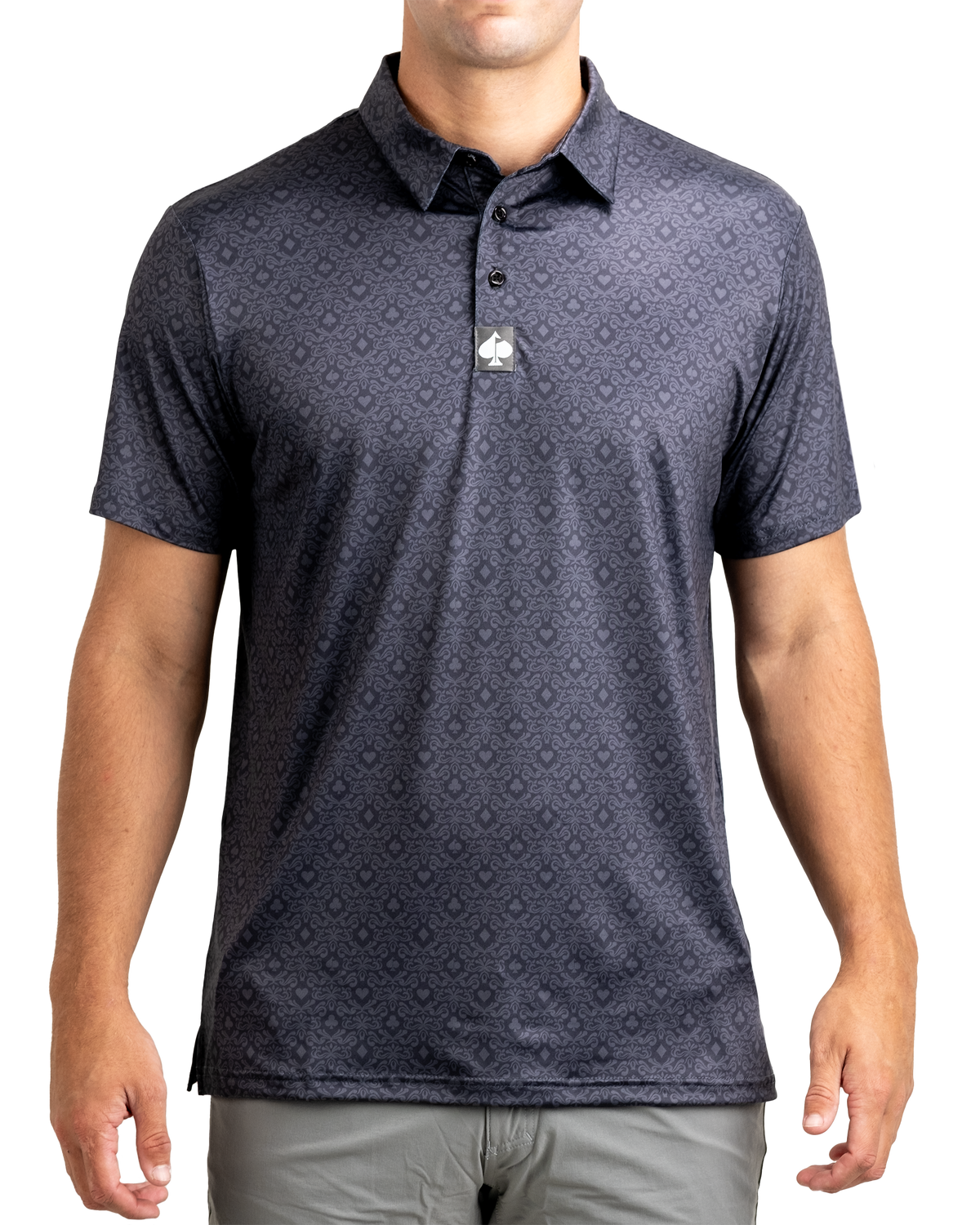 Men's golf polo shirt in dark navy with a subtle playing card pattern, designed for style and comfort on the course.