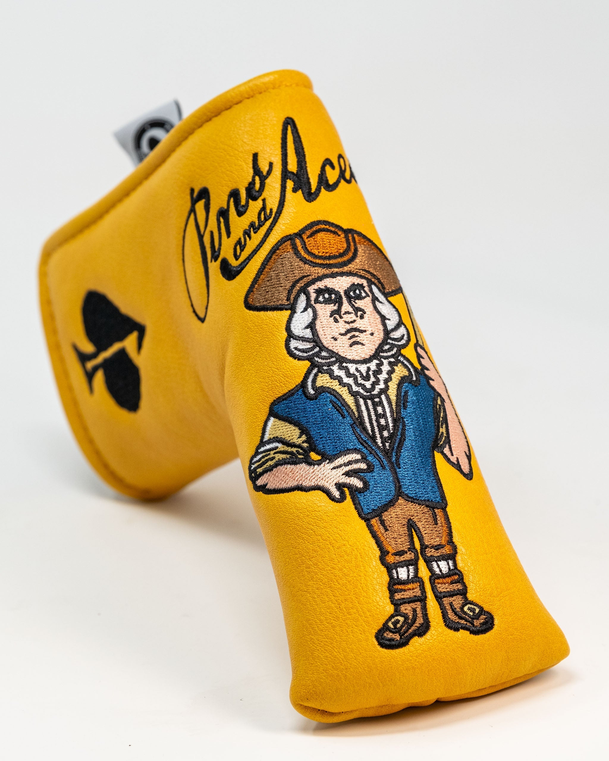 Bold yellow putter cover featuring a patriotic character design, perfect for golfers wanting to stand out on the course.