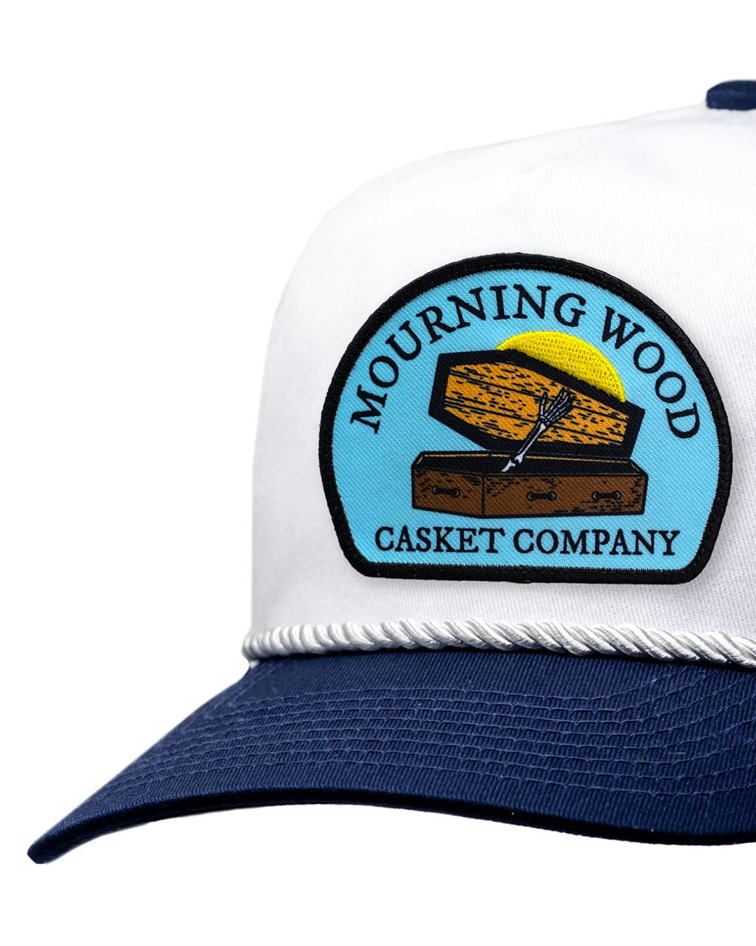 Heritage Rope Hat in Mourning Wood color, featuring a decorative patch and an Admiral brim, displayed from the front.