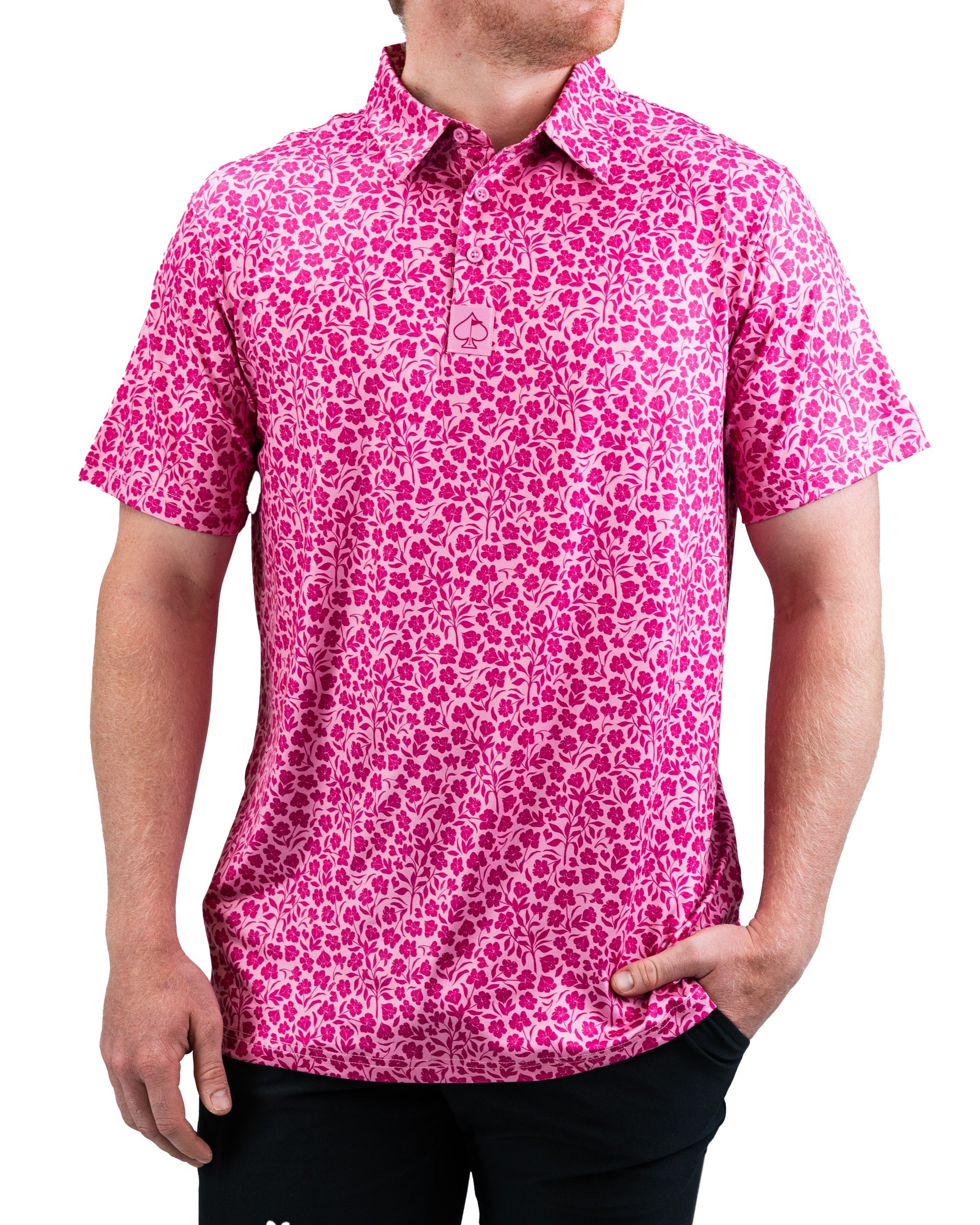 Pink hibiscus flower with vibrant petals and lush green leaves, showcasing its natural beauty.