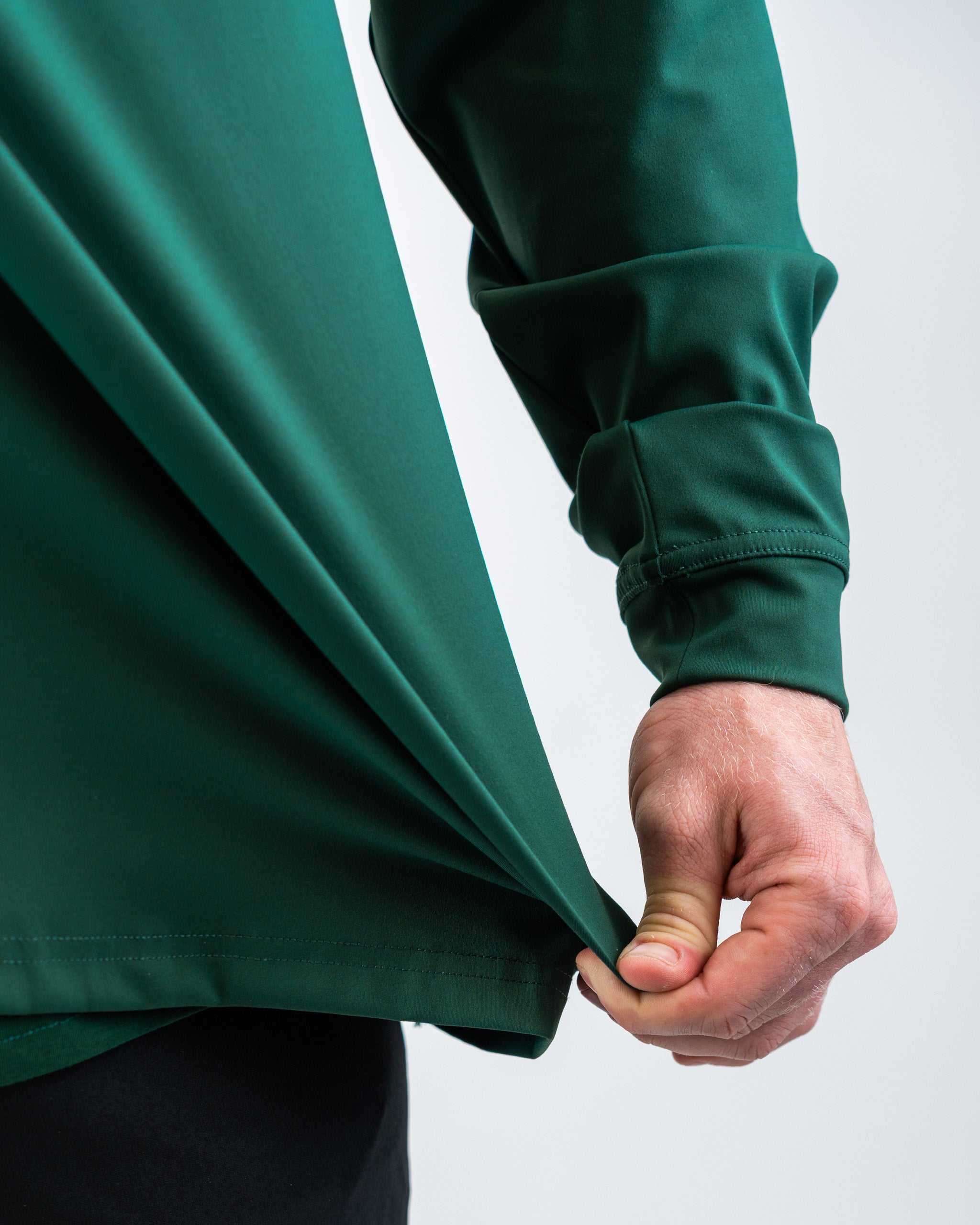 Performance Golf Hoodie in Pimento 4.0, featuring a modern design with adjustable hood and moisture-wicking fabric.