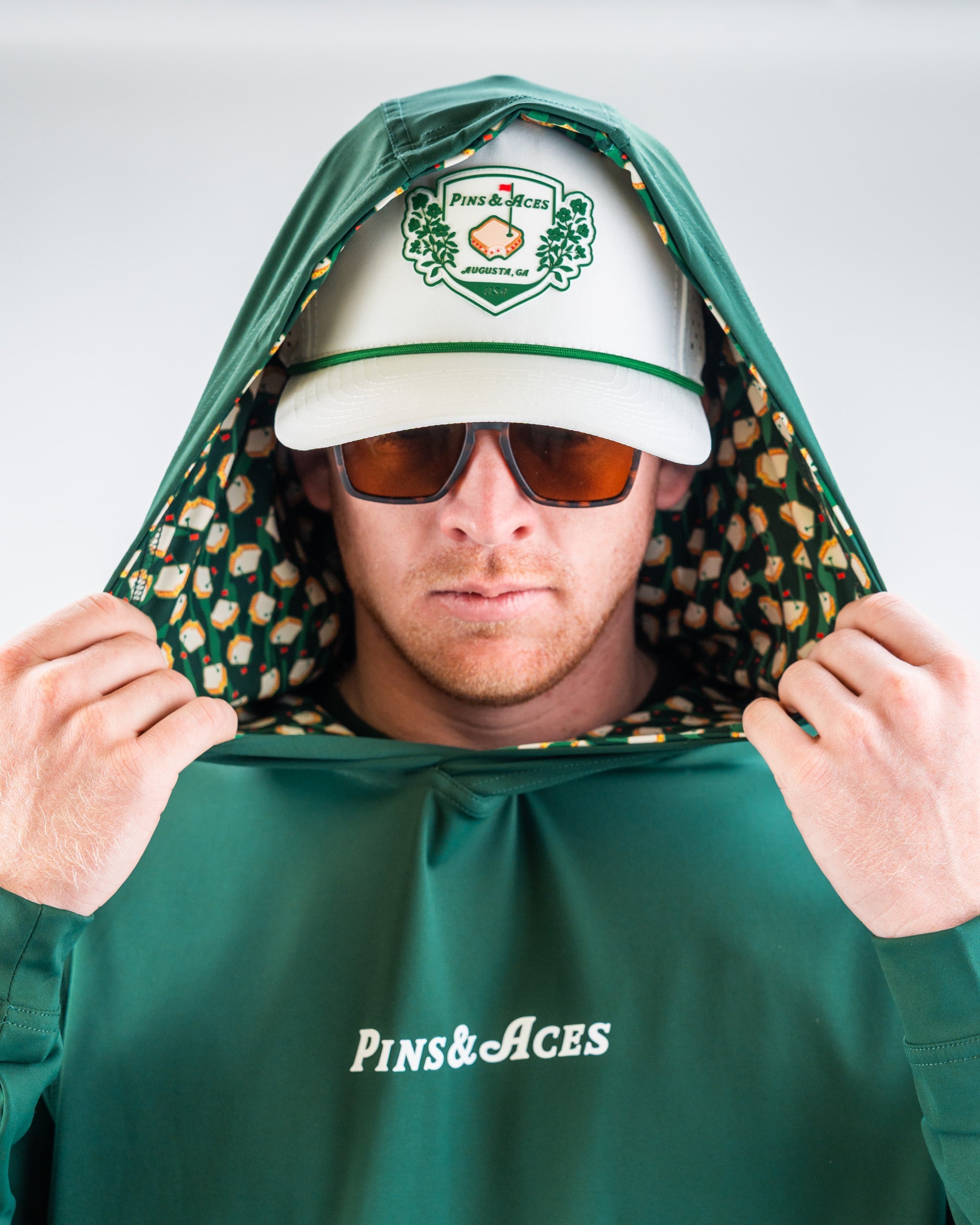 Red Performance Golf Hoodie - Pimento 4.0, featuring a modern design and lightweight fabric for comfort during play.