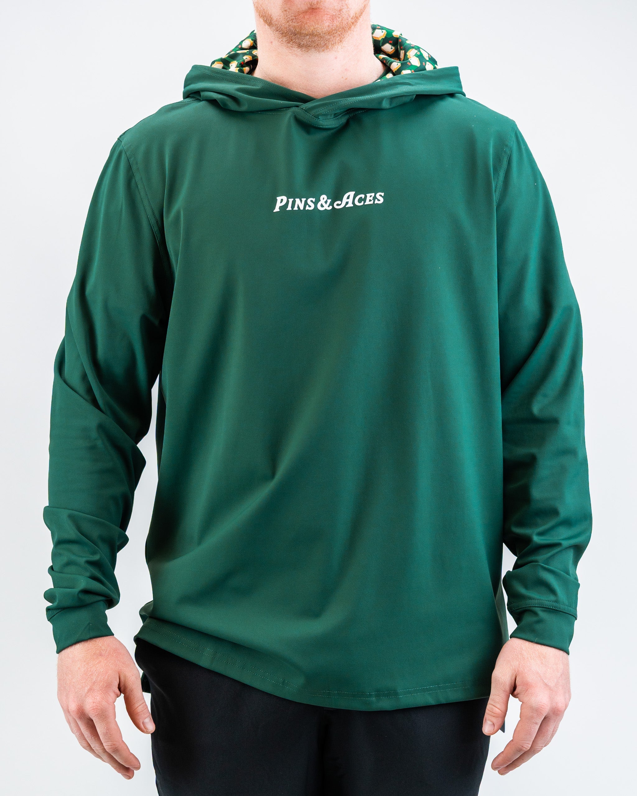 Performance Golf Hoodie in Pimento 4.0, featuring a sleek design and comfortable fit, ideal for golf enthusiasts.