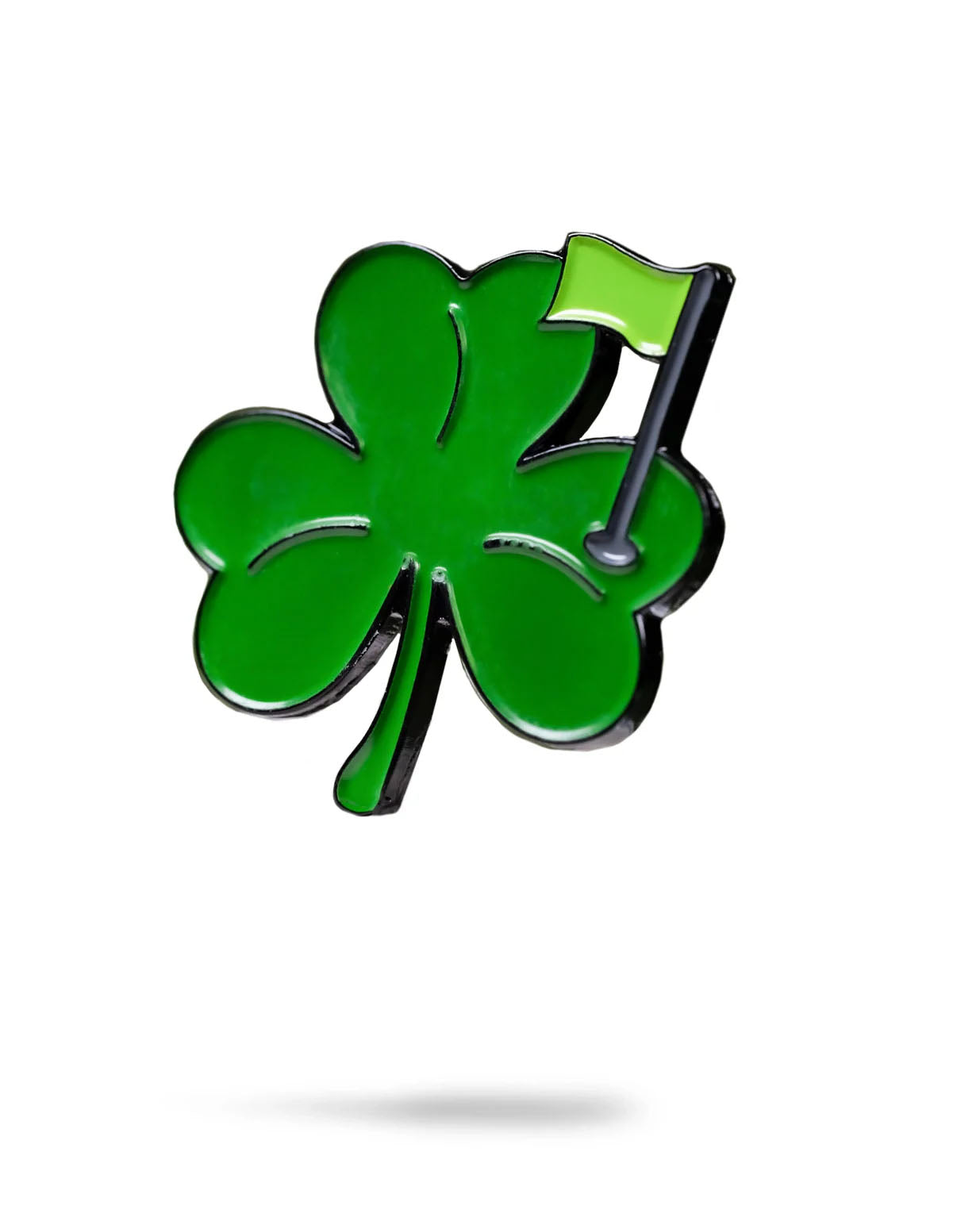 Shamrock-shaped ball marker with a smiling design for golf enthusiasts.