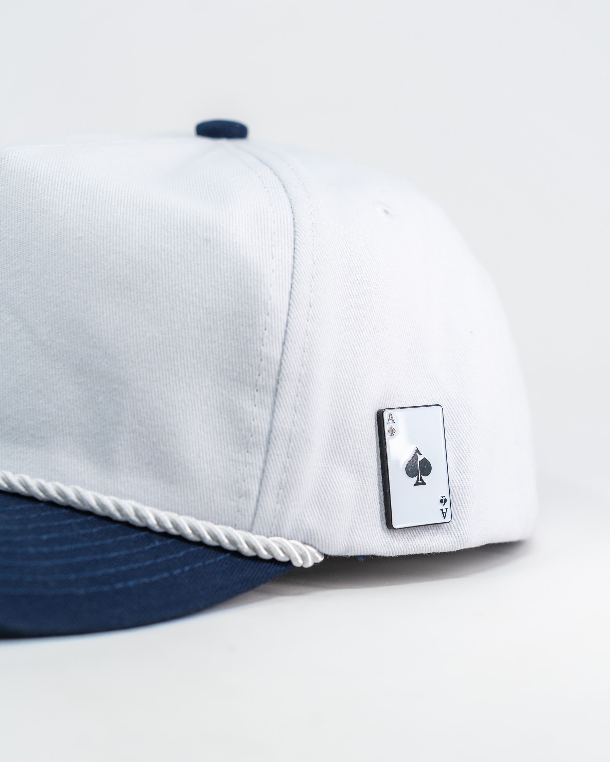 Heritage Rope Hat in Navy Blue featuring Space Golfer design, with a classic rope detail and adjustable snapback.