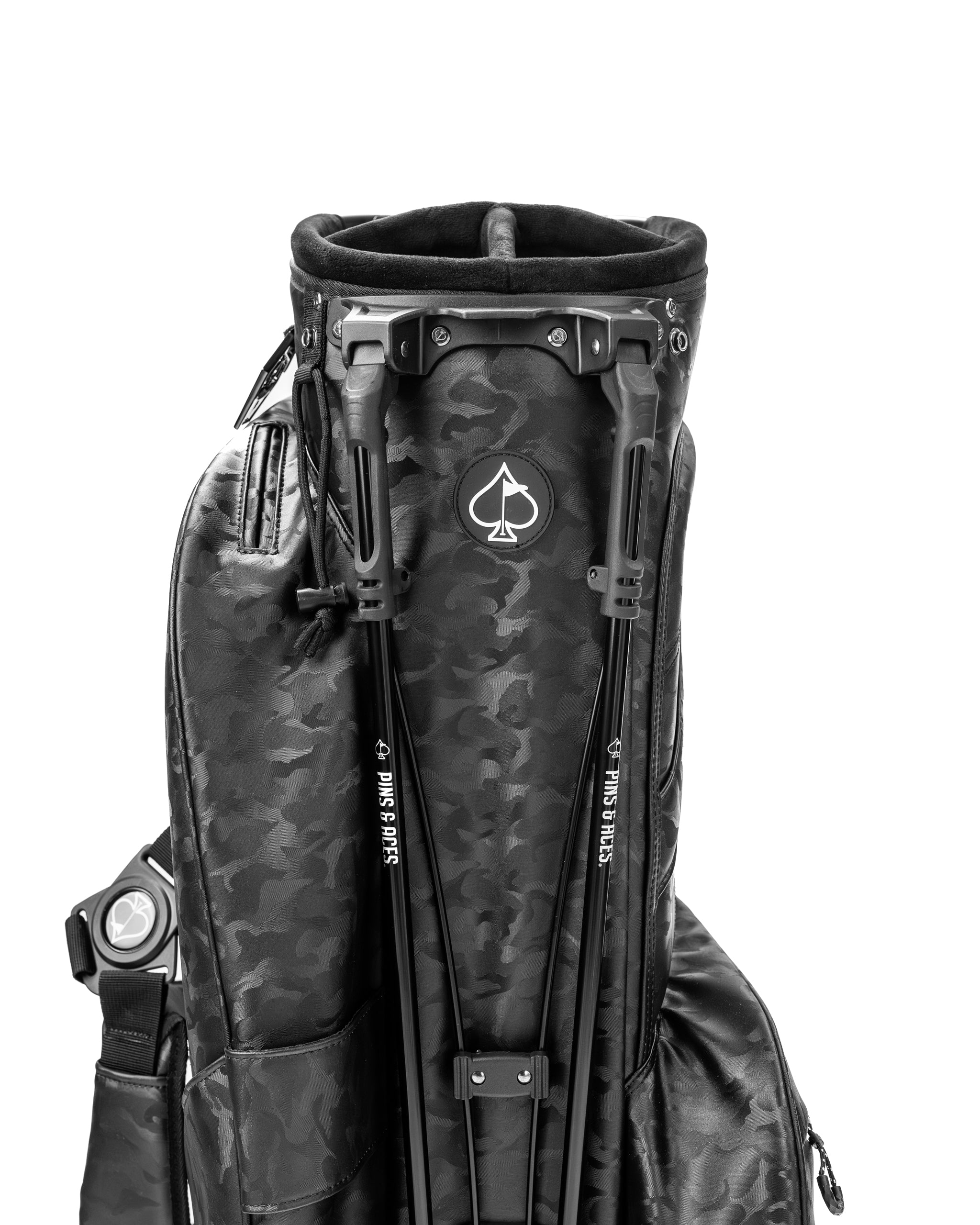 Black camo golf bag featuring a sleek design and multiple pockets for storage, ideal for stylish golfers.