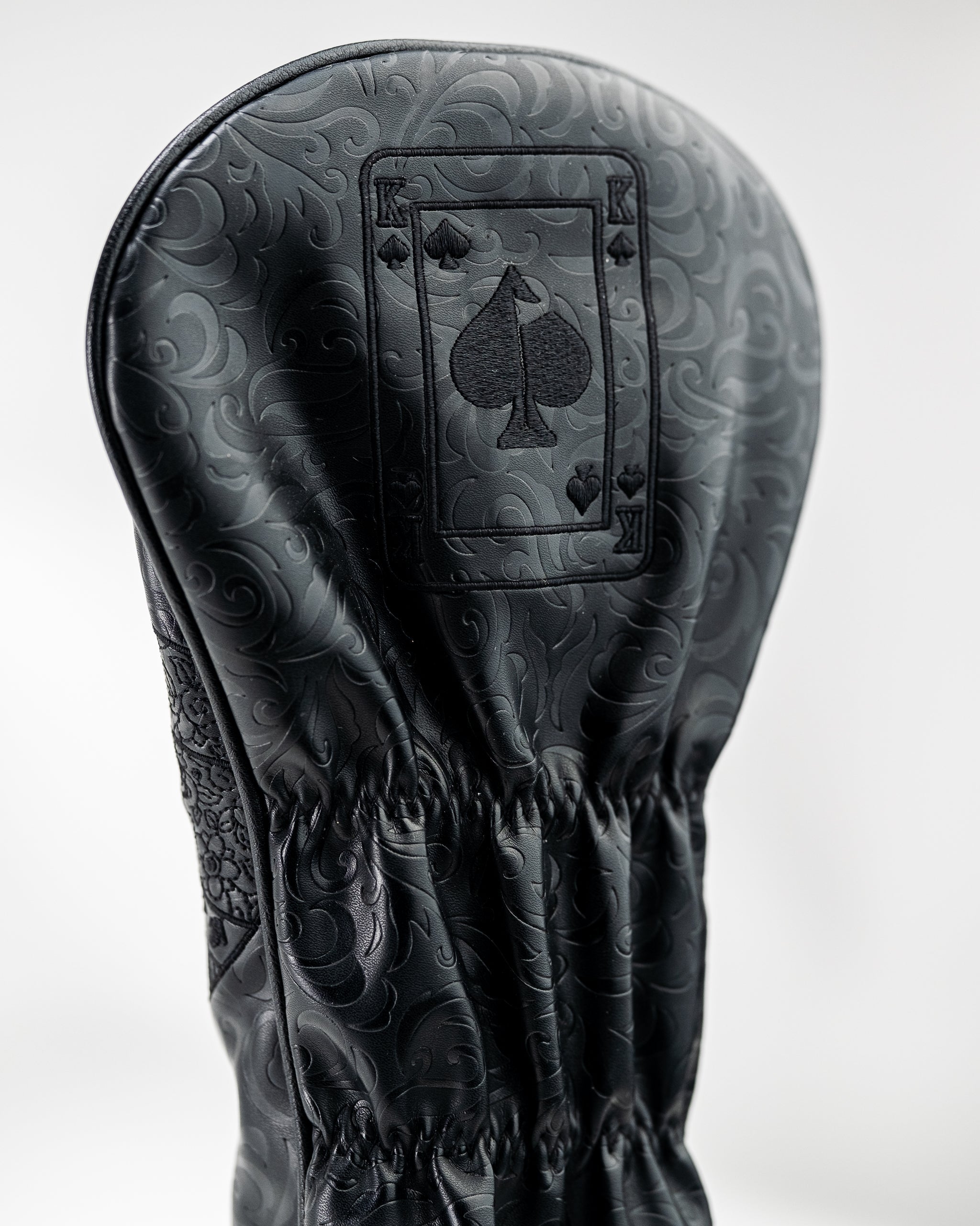 Blackout King of Spades driver cover featuring a sleek design with a black finish and gold accents.