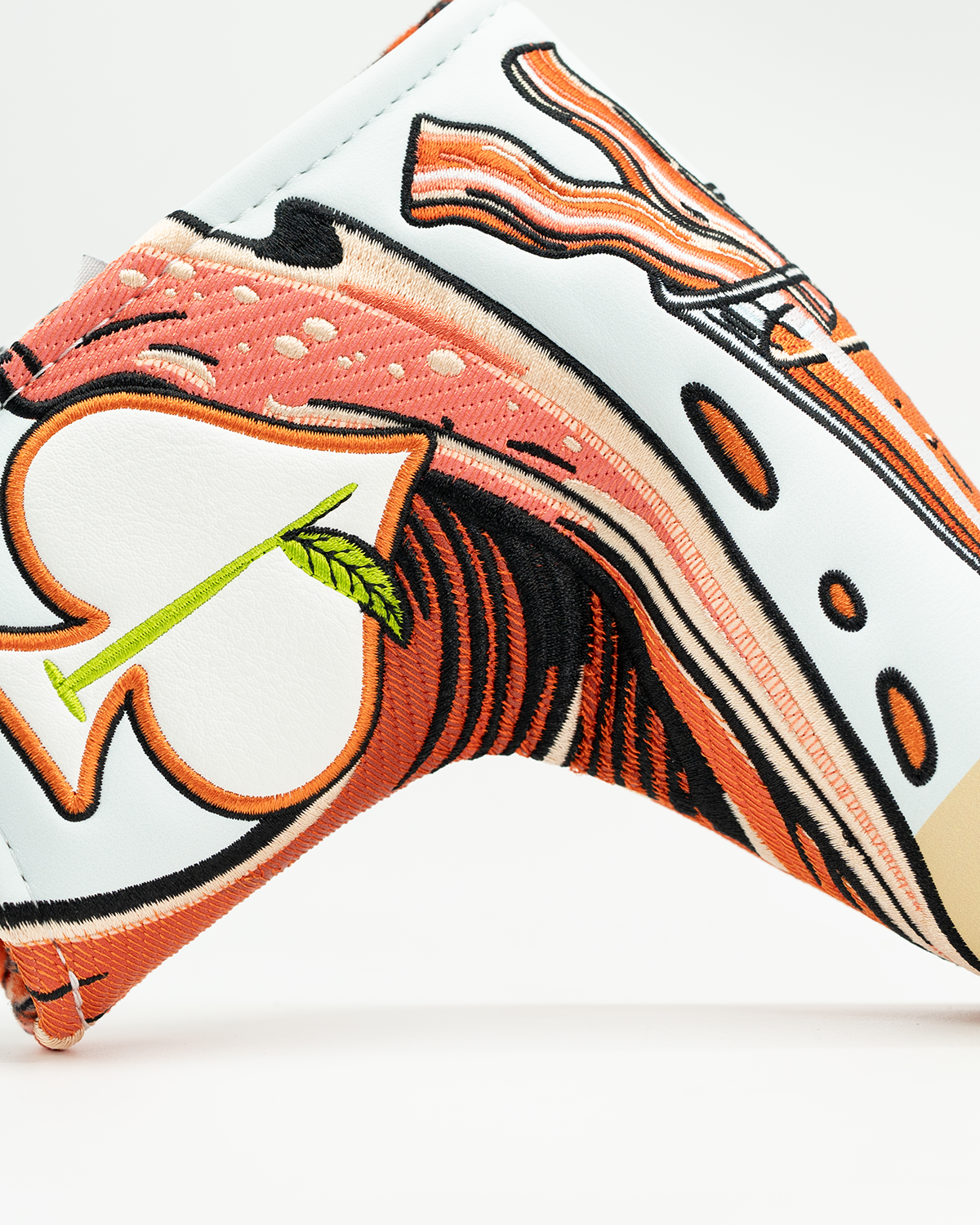 Bold Bloody Mary blade putter cover featuring vibrant graphics of a cocktail with bacon and garnishes, perfect for unique golf style.