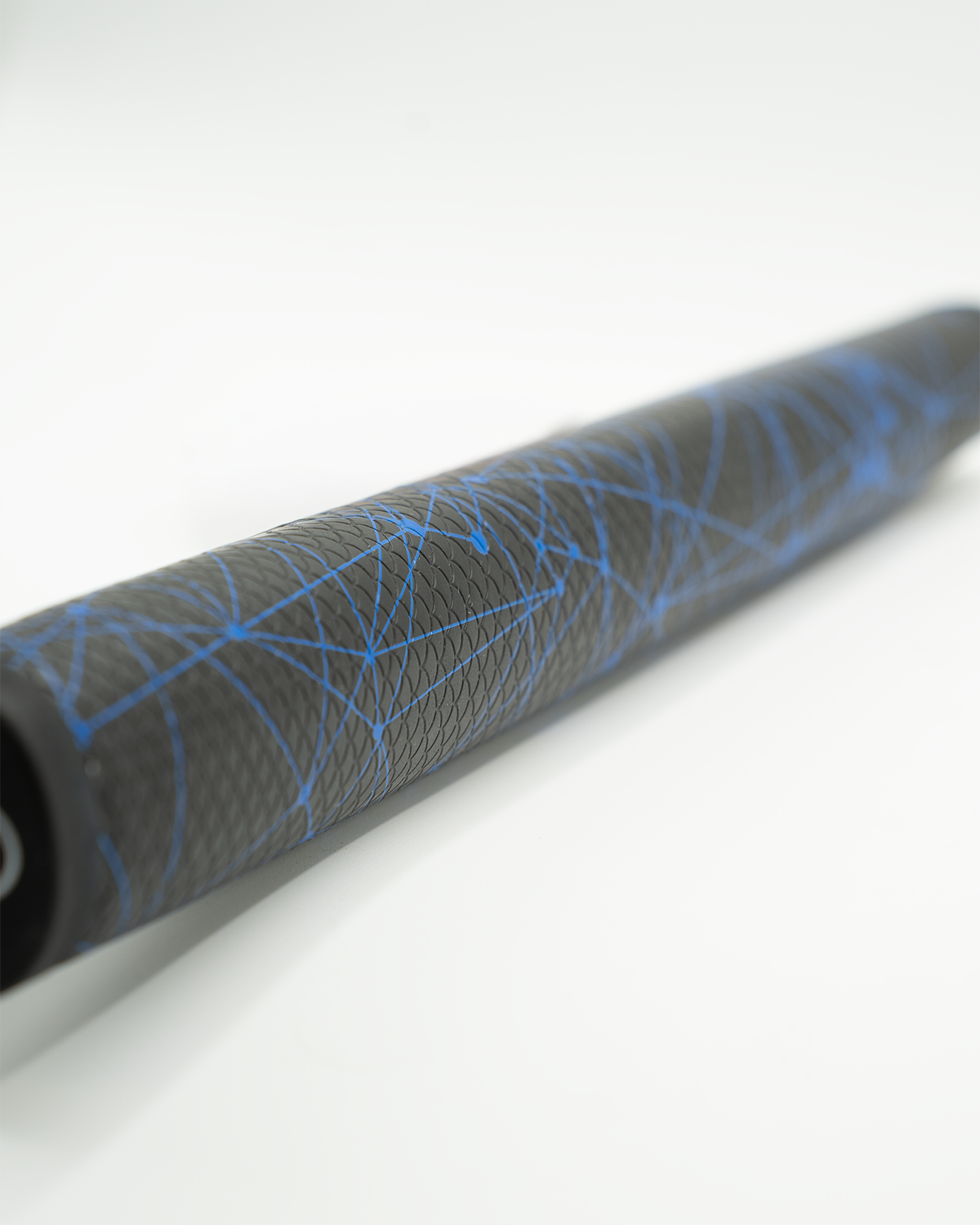 Black golf club grip with blue geometric patterns and textured surface, designed for bold, standout style on the course.