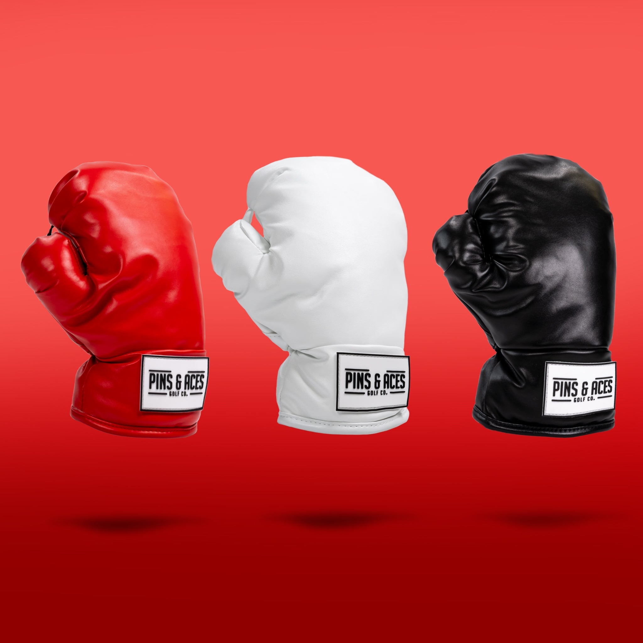 Black boxing glove fairway cover with a stylish design for golf clubs.