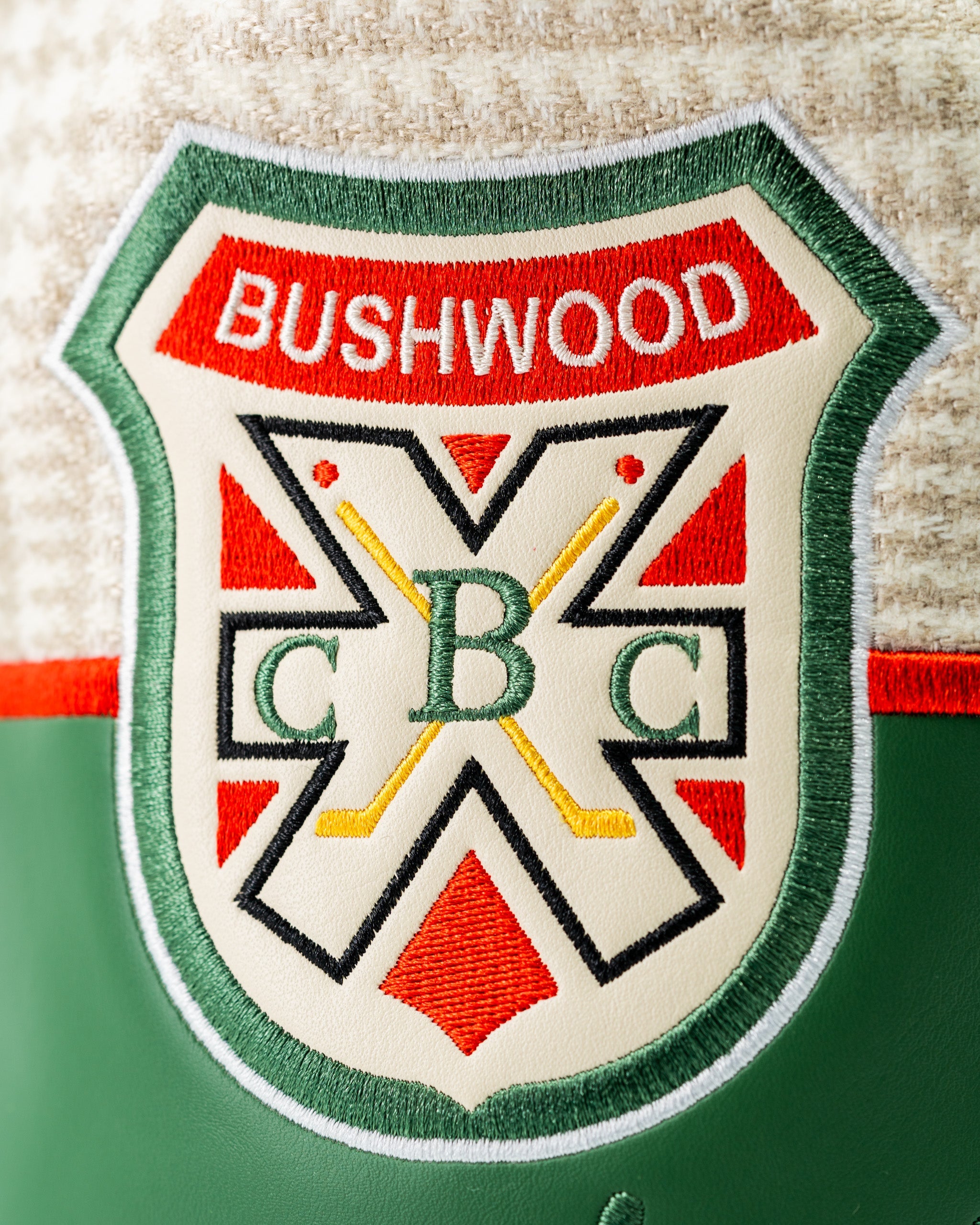 Bushwood CC driver cover featuring a vibrant embroidered logo with a classic design, perfect for stylish golfers.