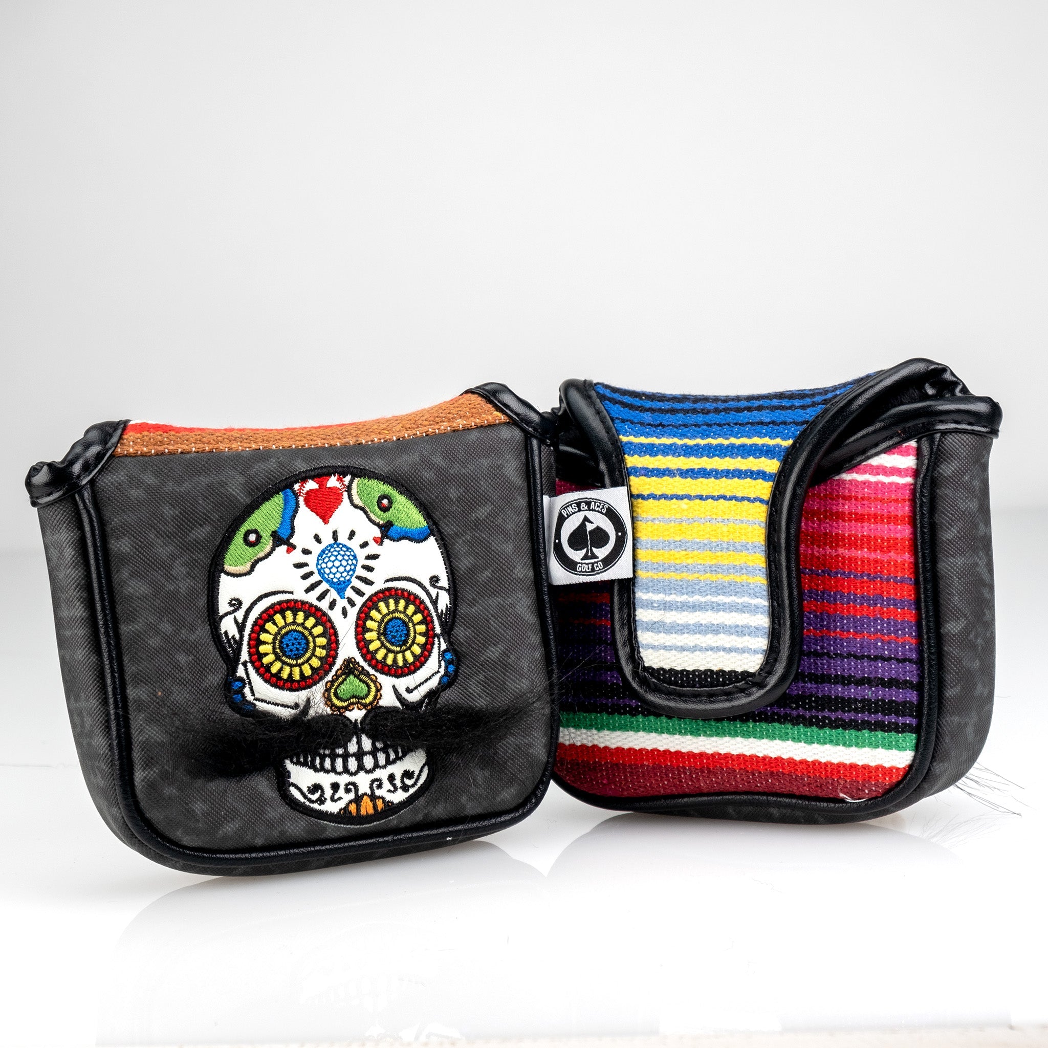 Gray camo putter cover featuring a mustache sugar skull design.