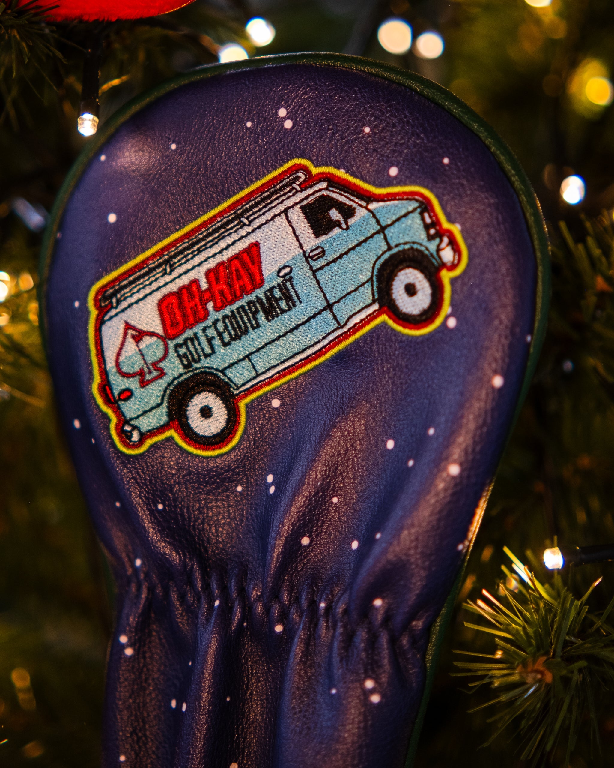 Wet Bandits Fairway Cover featuring a festive Christmas tree design, ideal for protecting golf clubs and adding holiday flair to the golf course.