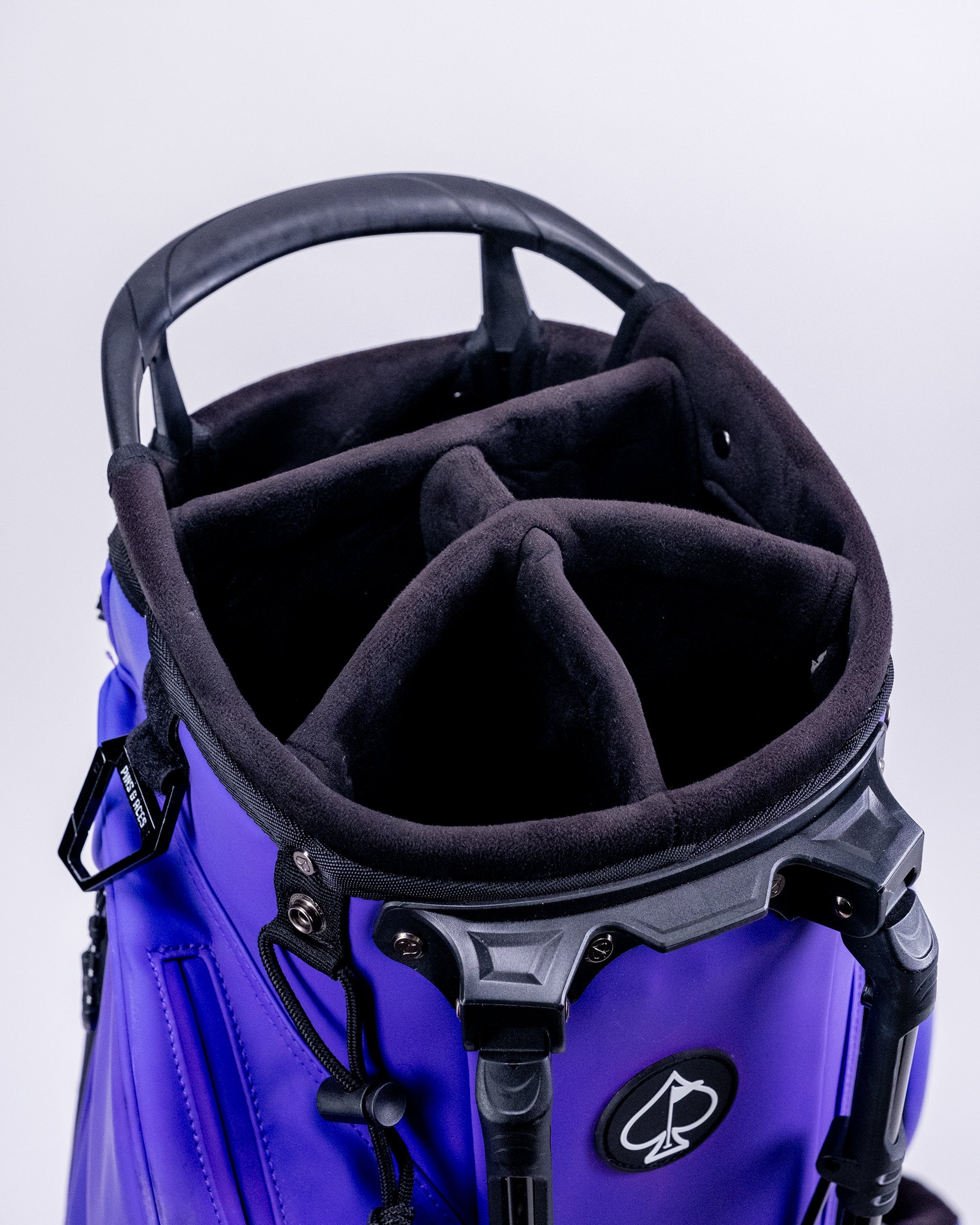 Alt text: Player Preferred™ Golf Bag in Grape color with multiple pockets and padded straps, displayed against a neutral background.