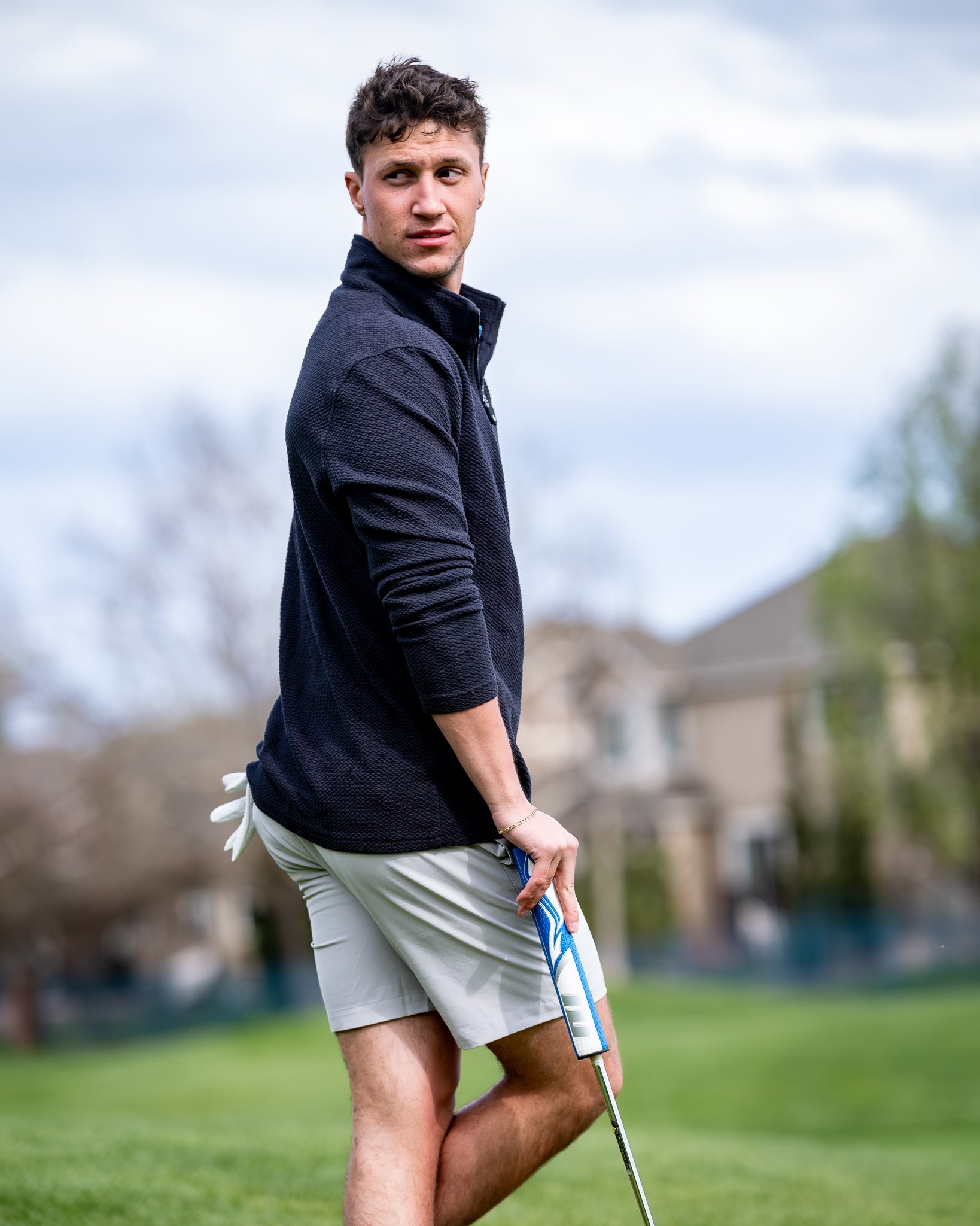 Performance shorts in dark stone color, featuring a sleek design and breathable fabric, ideal for activewear.