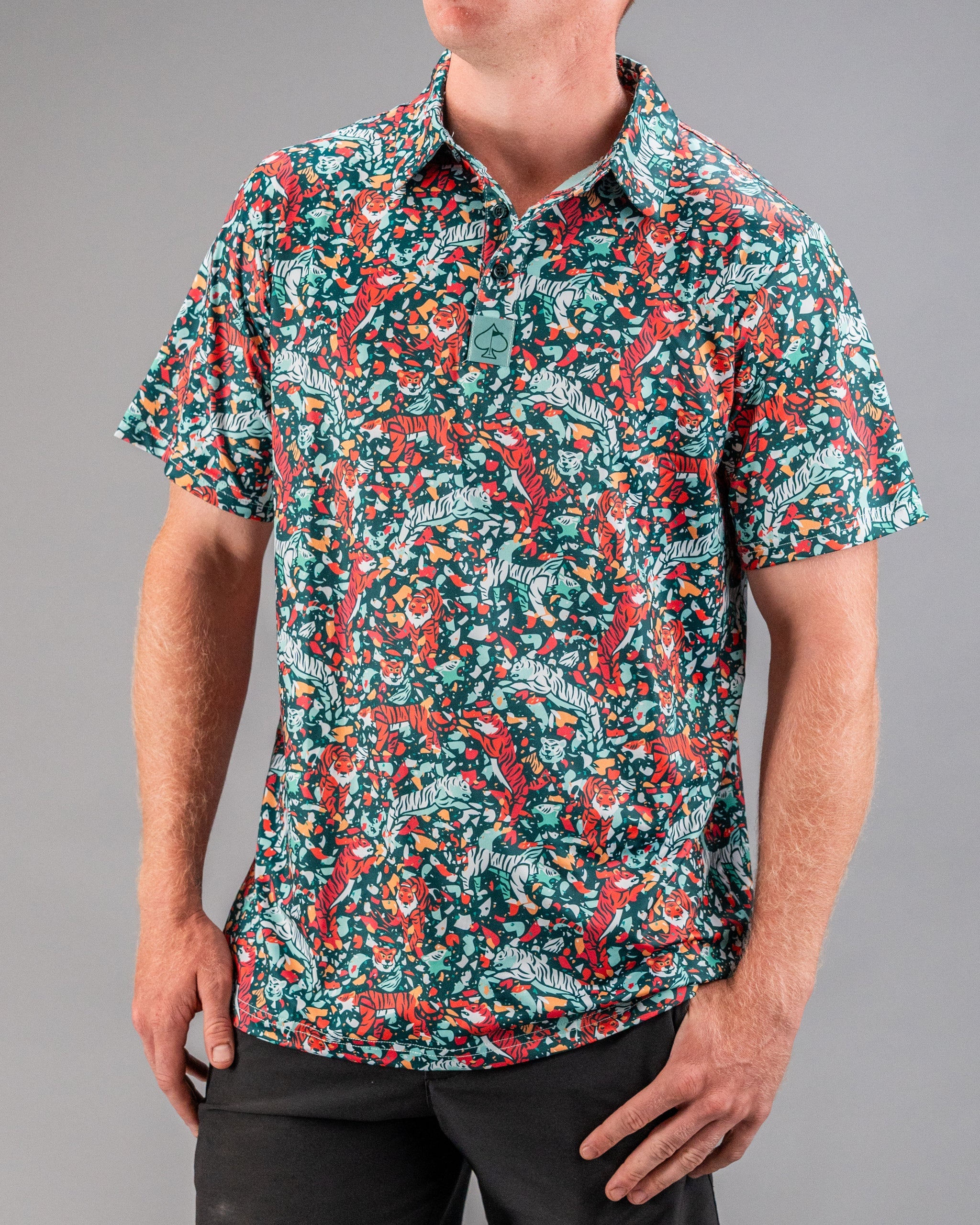 Bold teal golf shirt featuring a vibrant tiger and floral pattern, perfect for golfers who want to stand out on the course.