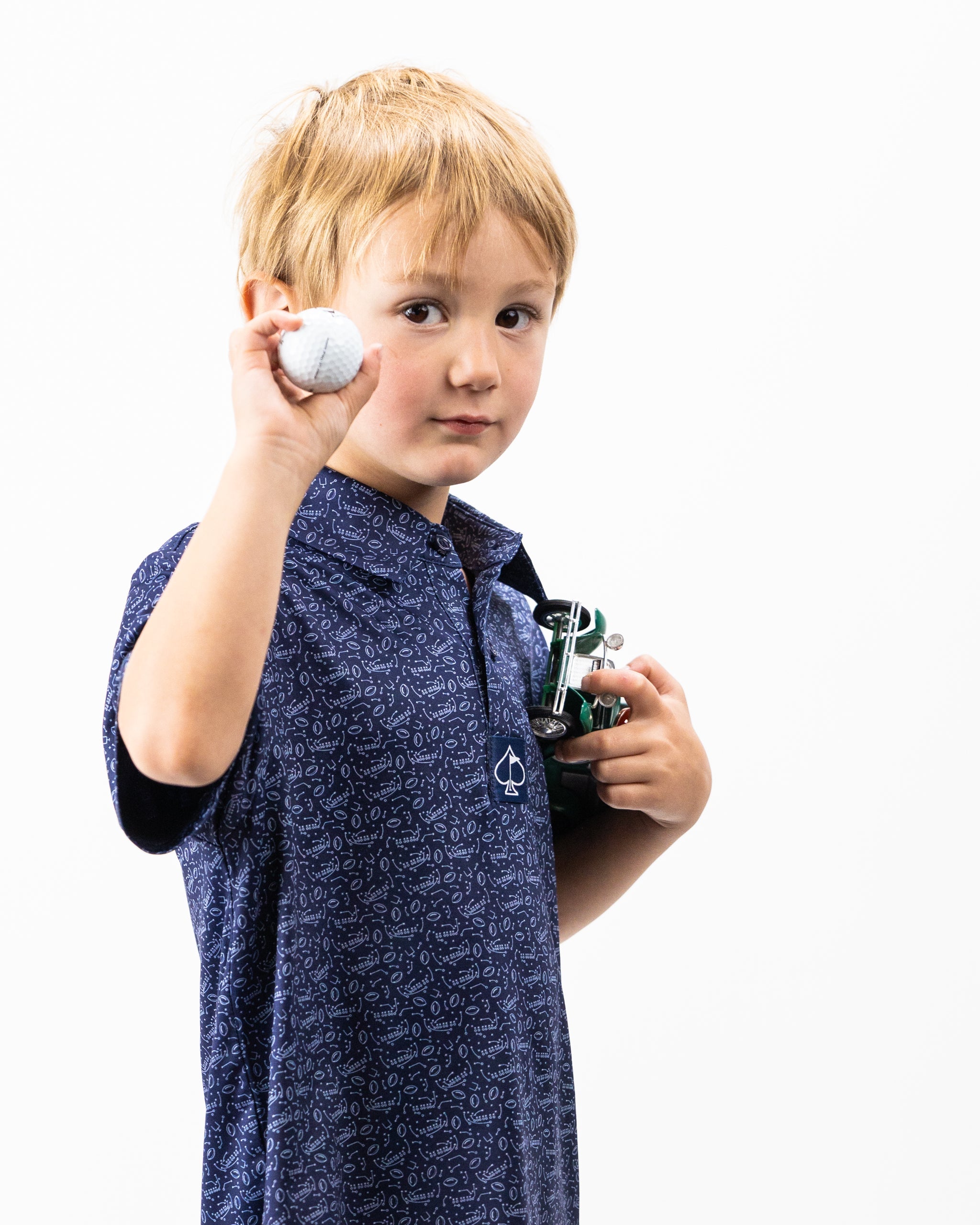 Youth Playmaker polo shirt in vibrant blue with contrasting collar and sleeves, suitable for sports and casual wear.