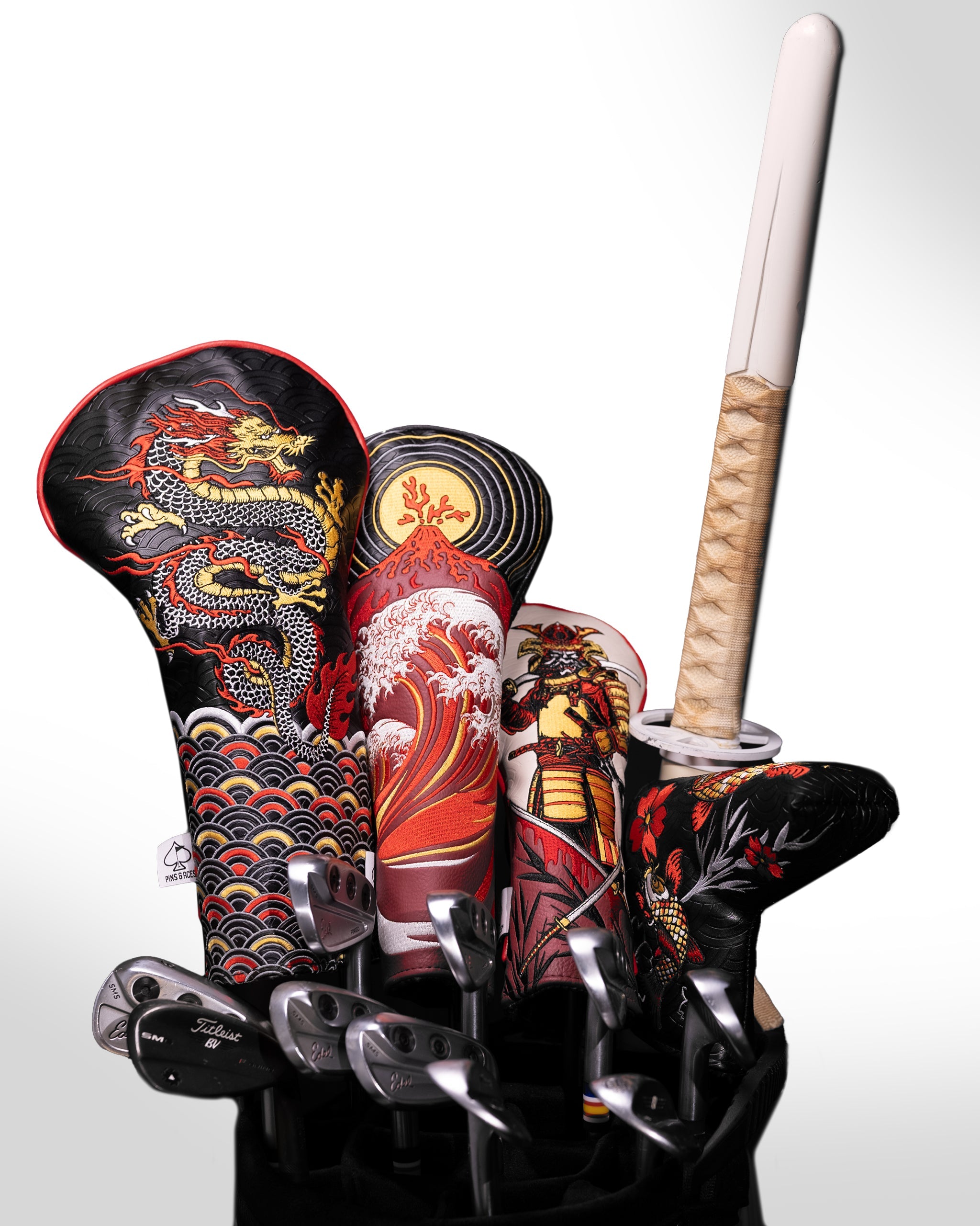 Koi Flow Blade Putter Cover featuring a sleek design with koi fish and wave patterns on a white background.
