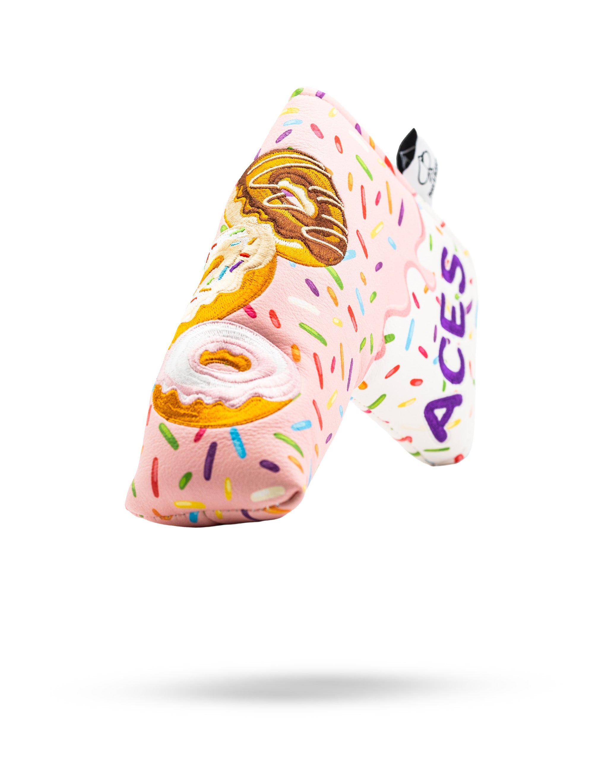 Colorful blade putter cover featuring a donut design with sprinkles, adding a fun touch to your golf gear.