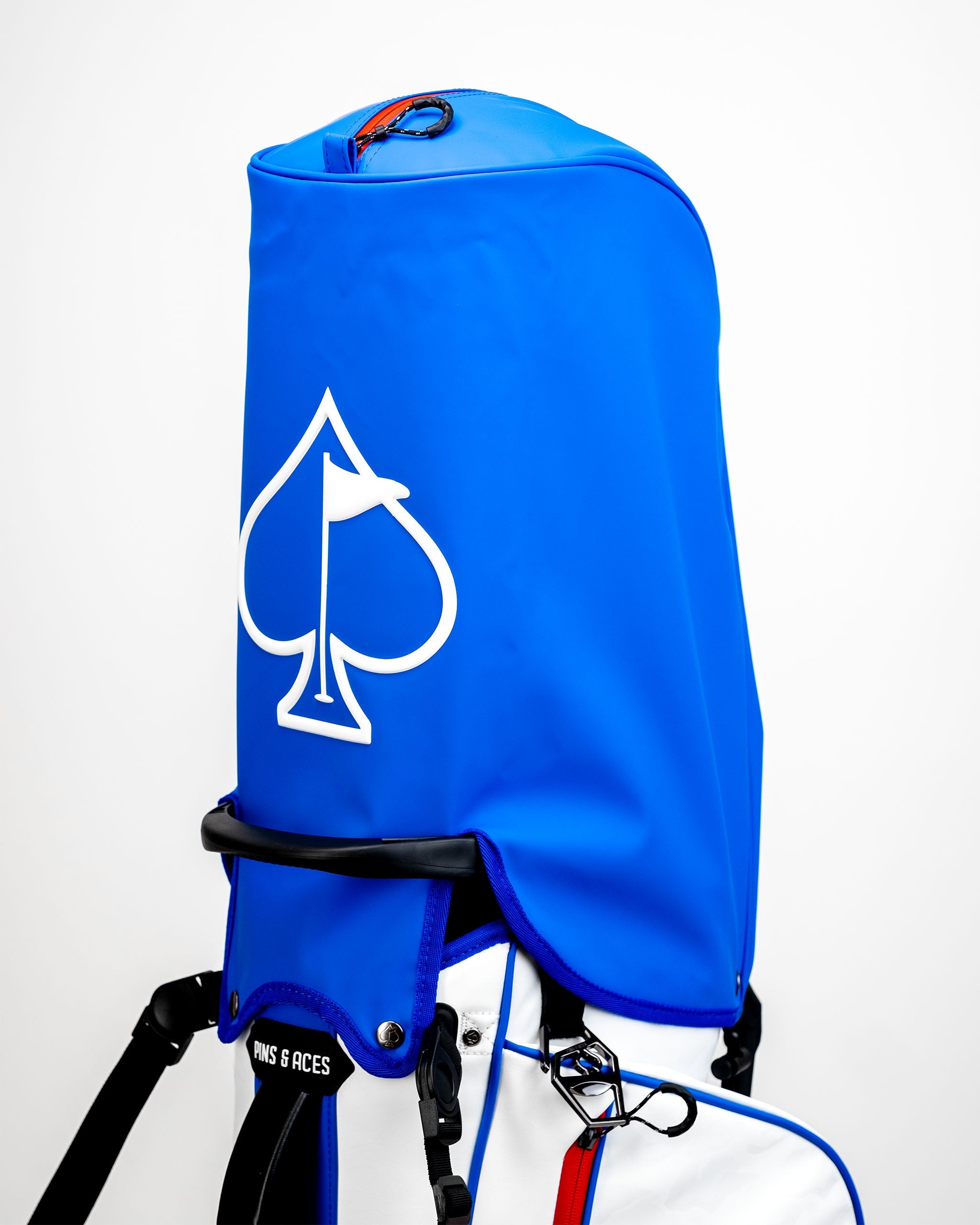 Player Preferred™ Golf Bag in navy and white with multiple pockets and adjustable straps, branded with Golf of America logo.