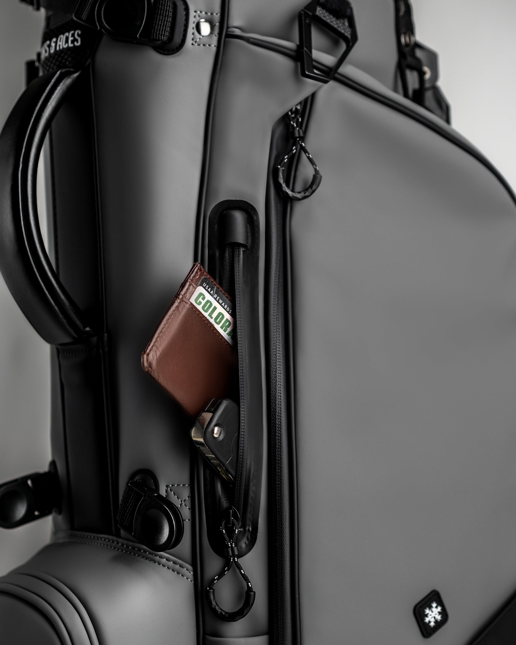 Player Preferred™ Golf Bag in Flat Ash color, showcasing a sleek design with multiple compartments for storage and an adjustable strap.