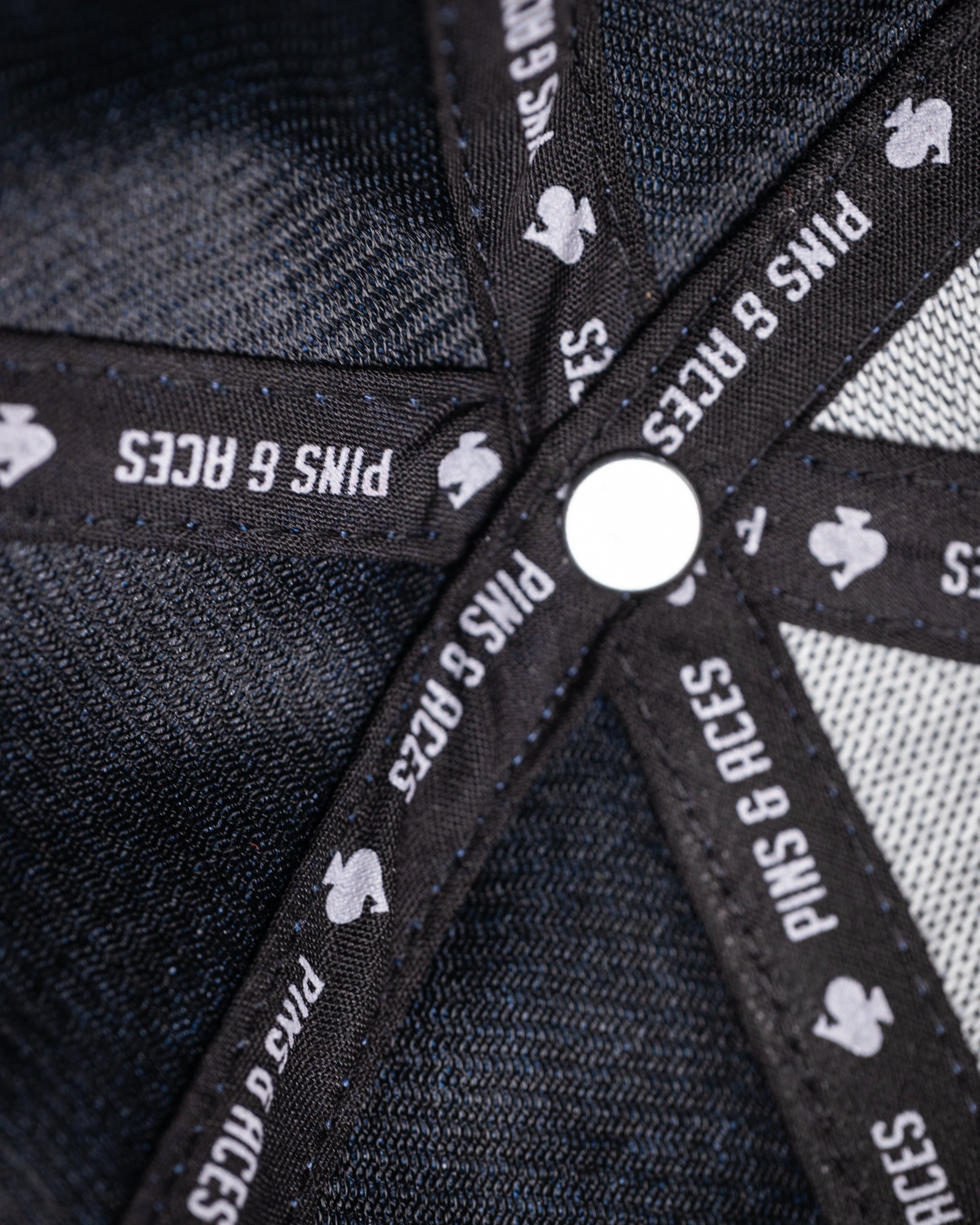 Performance Spade Hat in blue, featuring a stylish design, breathable fabric, and adjustable strap.