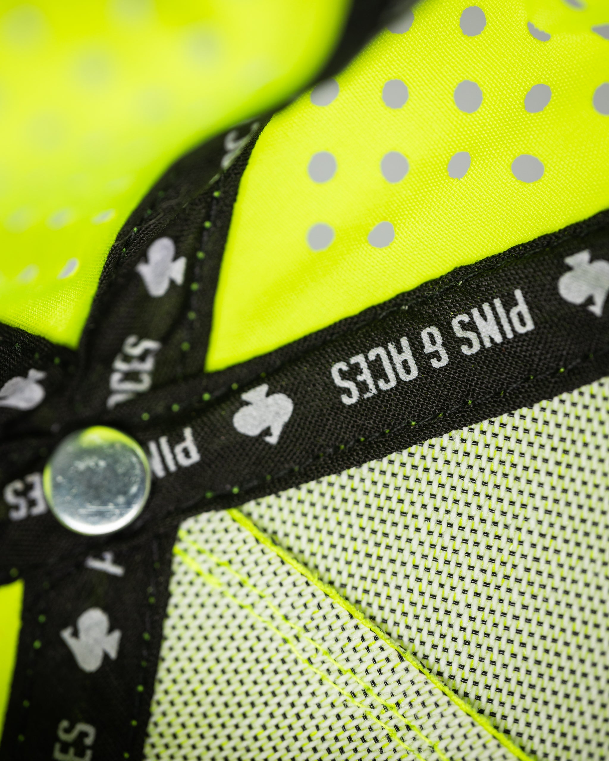 Perforated rope hat in highlighter yellow with a stylish design and adjustable strap.