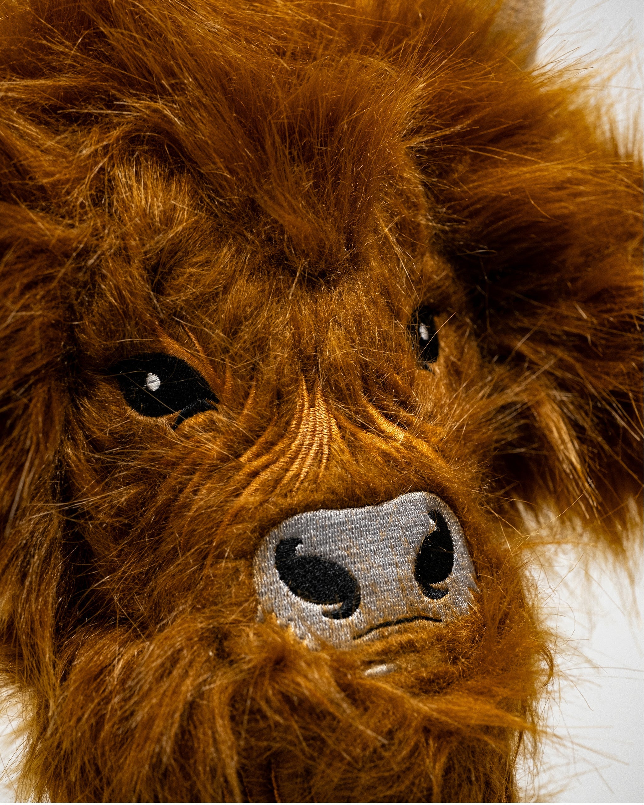 Highland cow fairway cover featuring a plush, colorful design, perfect for protecting golf clubs.