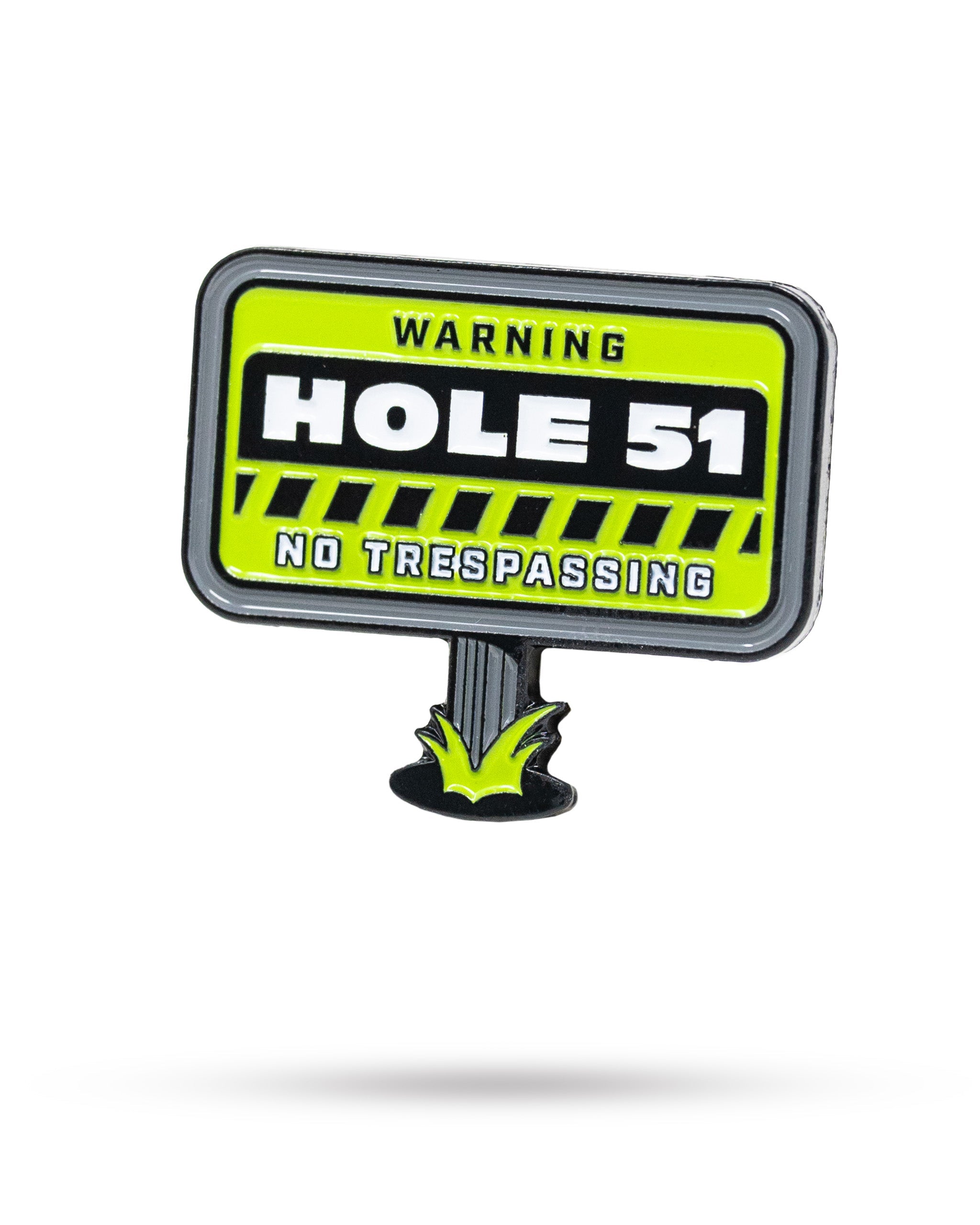 HEYDUDE Hole 51 Ball Marker featuring a colorful design with a circular shape and raised logo, ideal for golf enthusiasts.