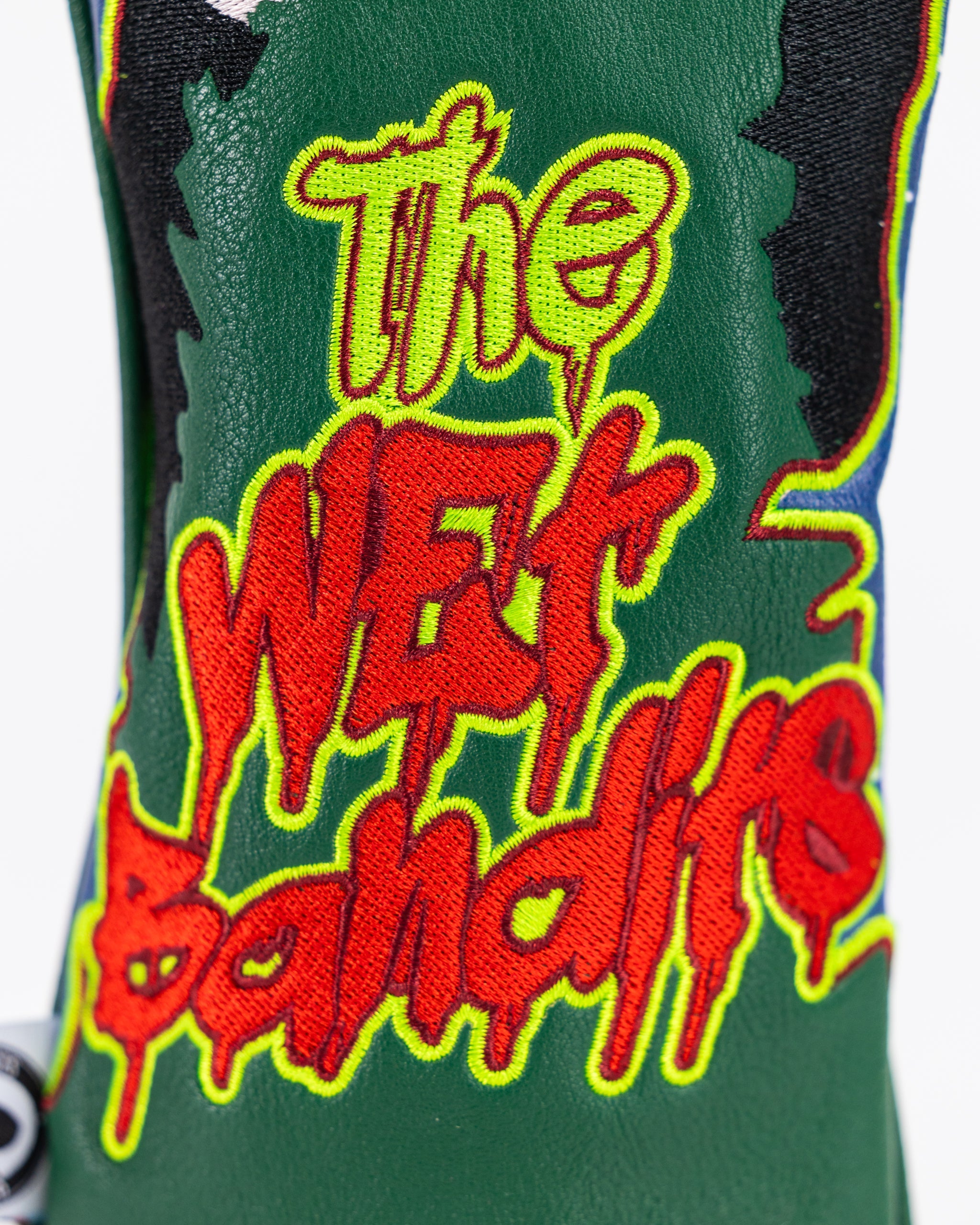 Wet Bandits Fairway Cover featuring a winter-themed design inspired by "Home Alone," with a playful character illustration and vibrant colors.