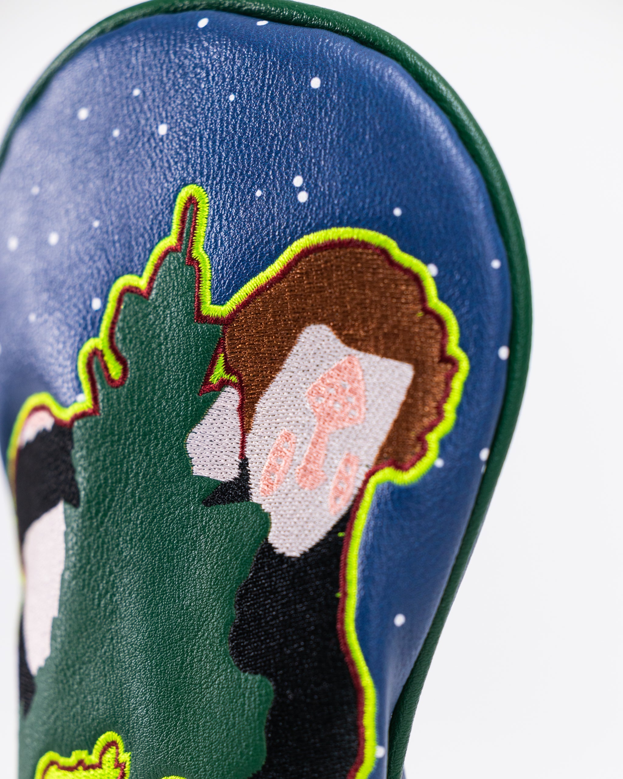 Wet Bandits Fairway Cover featuring a playful design inspired by the iconic characters from Home Alone, with detailed stitching and a vibrant color scheme.