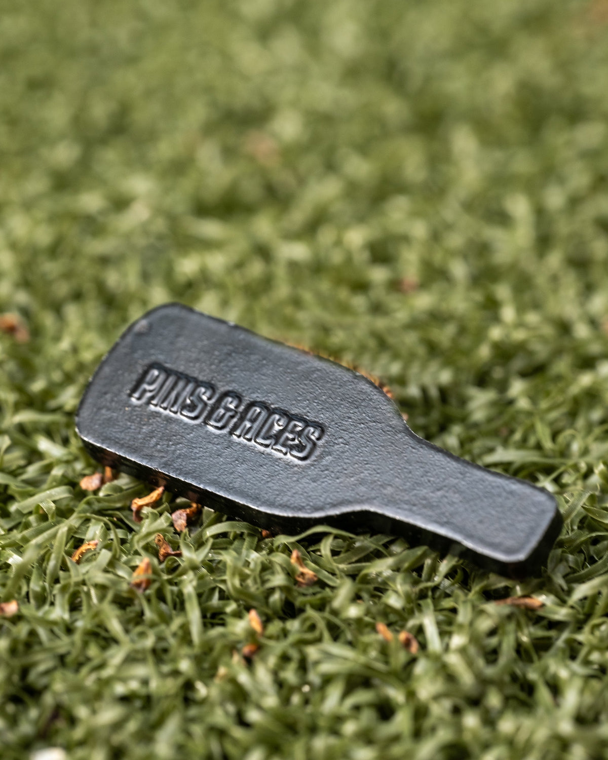 Louisiana Hot Sauce ball marker featuring a vibrant red design with the iconic branding on the front.