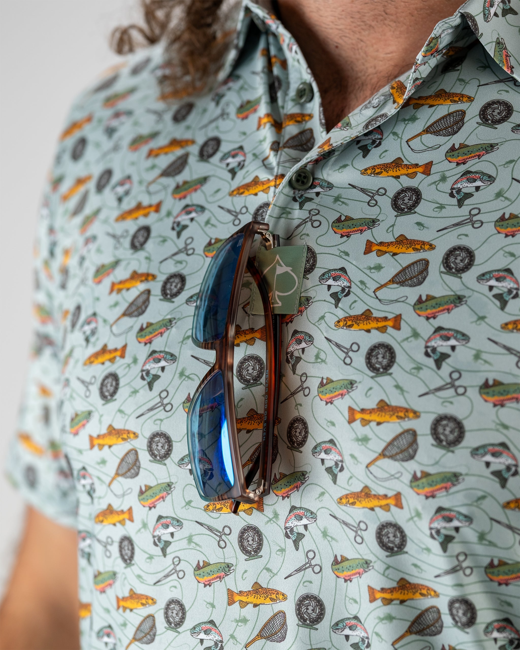 "Model wearing the Catch and Release product, showcasing its design and style in an outdoor setting."