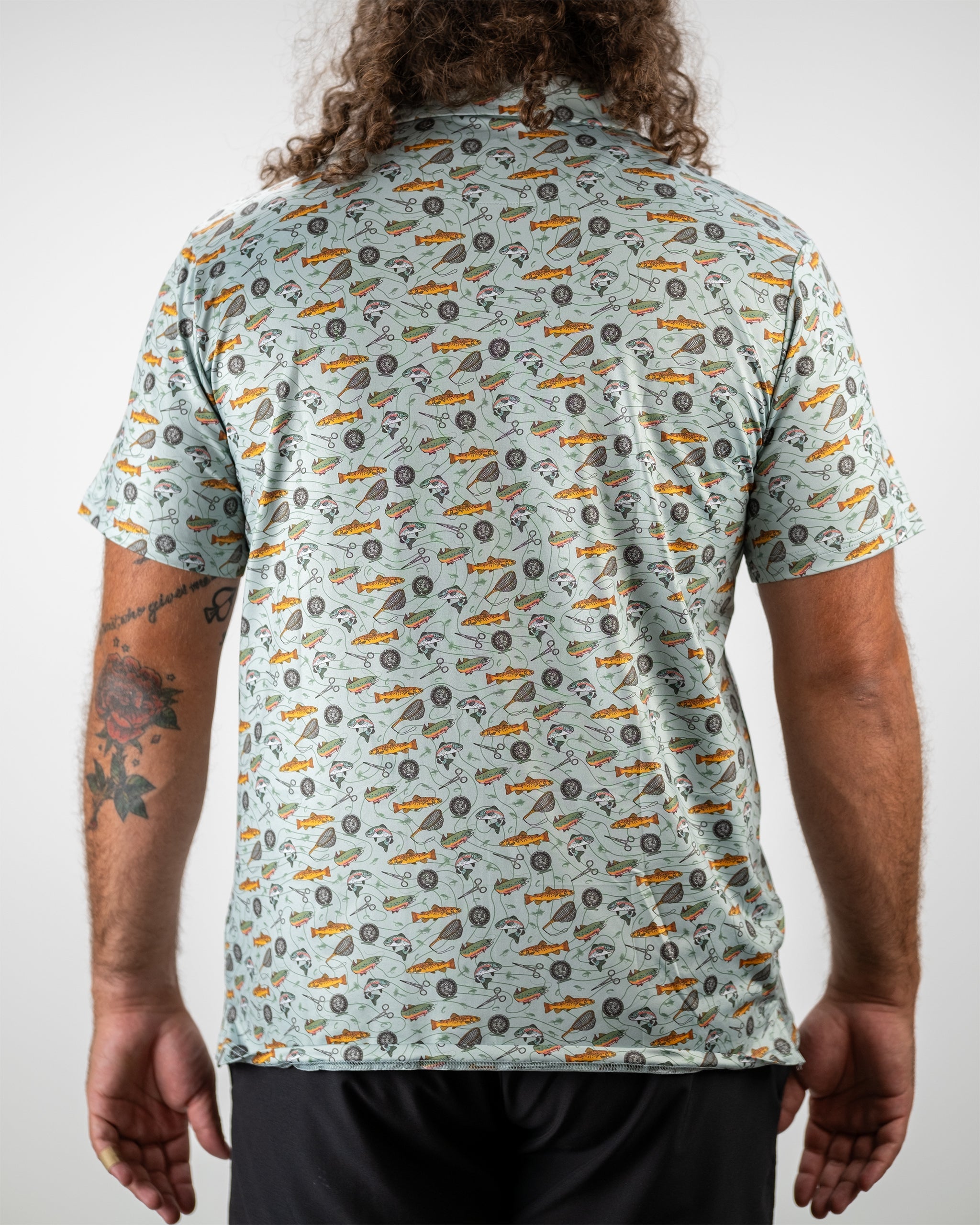 "Catch and Release graphic featuring a vibrant design with an outdoor theme, showcasing a model in action with fishing gear."