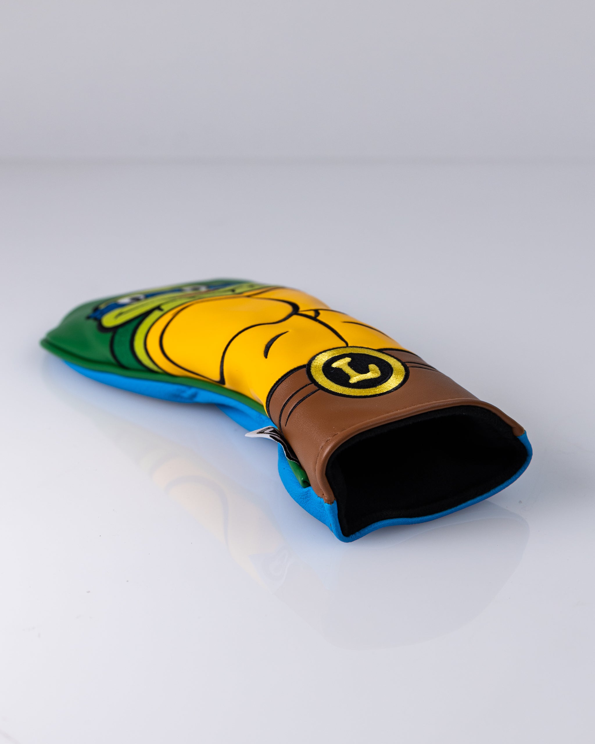 TMNT Leonardo hybrid golf club cover featuring a vibrant design of the blue-masked turtle, showcasing his signature sword and iconic colors.