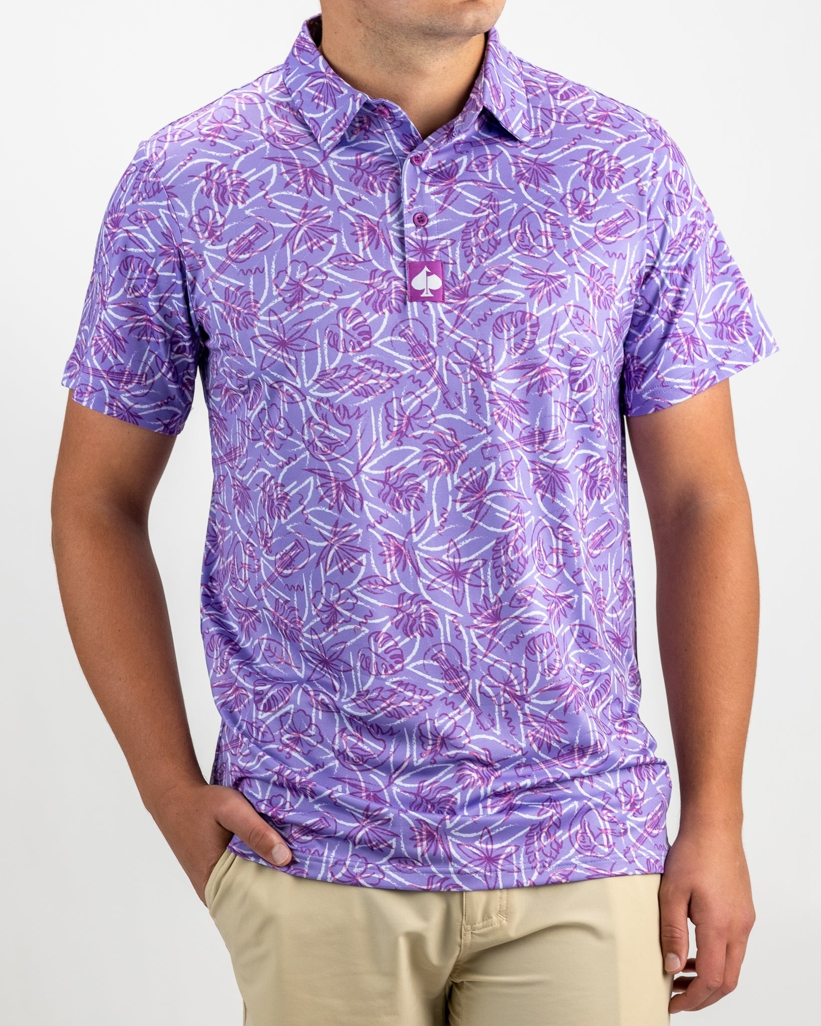 Margaritaville 5 O'Clock Sunset polo shirt, featuring a vibrant sunset design with palm trees and ocean waves.