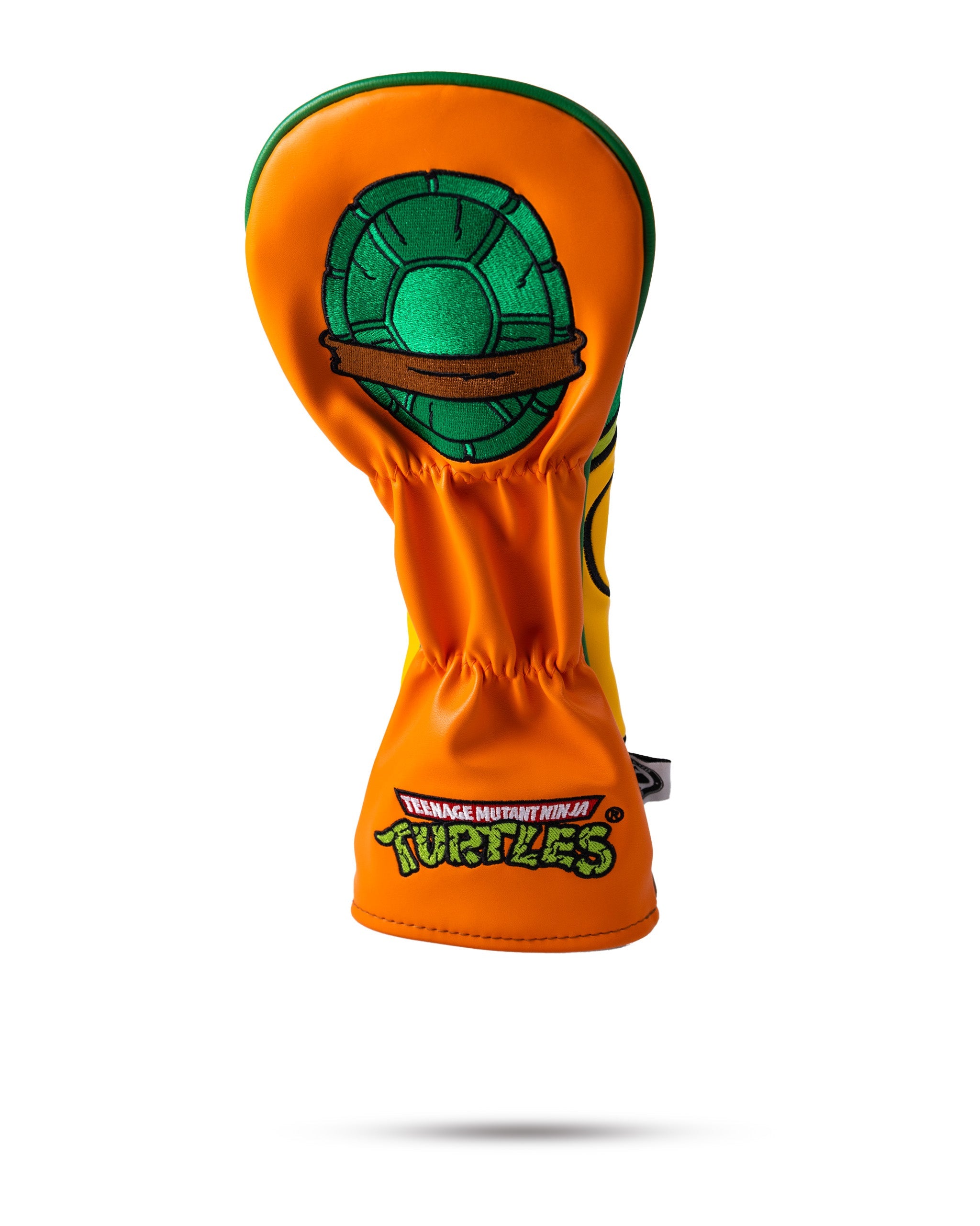 Michelangelo TMNT fairway cover in vibrant orange, featuring a ninja turtle design with a playful expression, ideal for golf clubs.