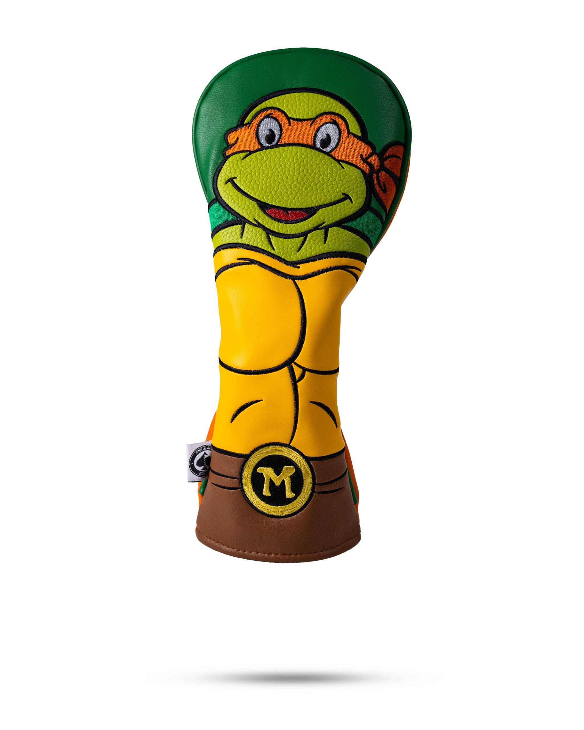 Alt text: "TMNT Michelangelo fairway cover featuring a vibrant green and orange design with a playful turtle motif."
