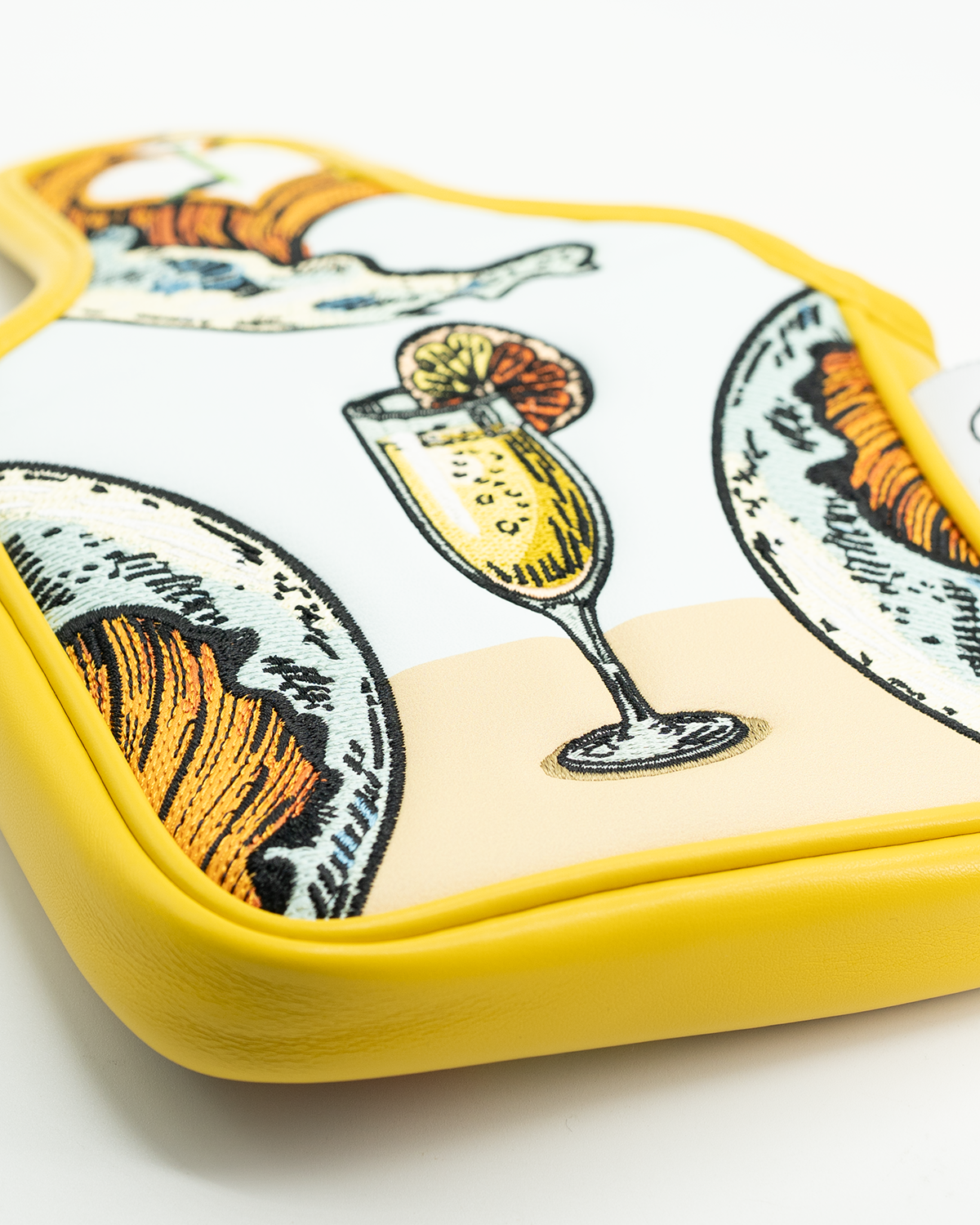 Mimosa mallet putter cover featuring vibrant illustrations of cocktails and brunch items on a white background with yellow trim.