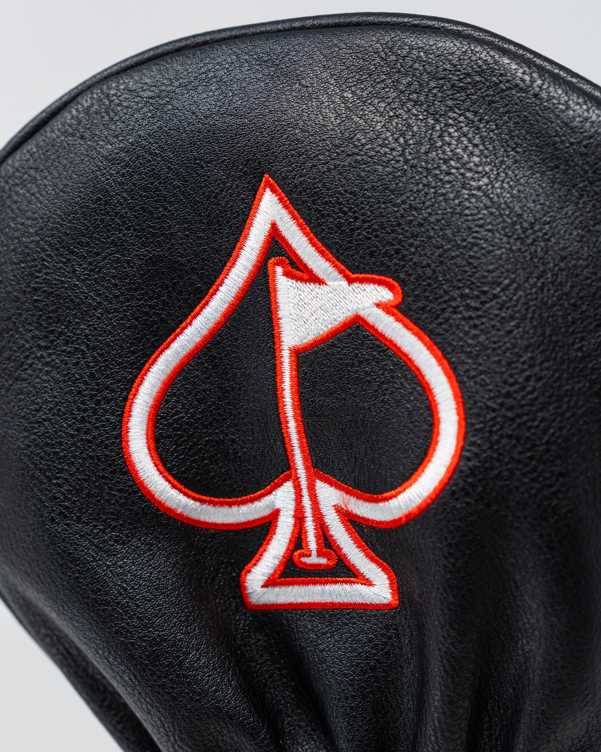 Music City driver headcover featuring a vibrant design with musical notes and a city skyline motif, crafted for golf club protection.